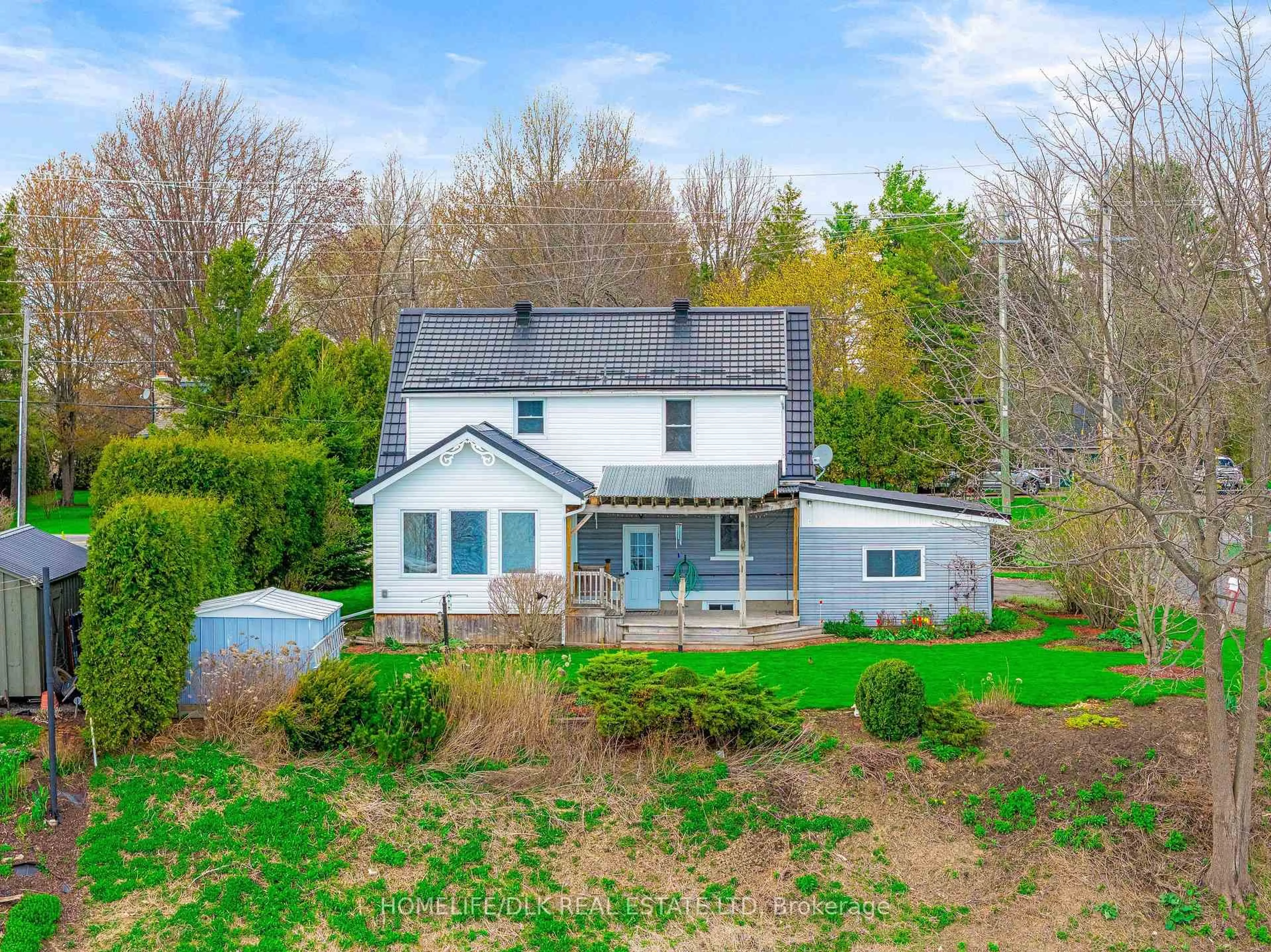 A pic from outside/outdoor area/front of a property/back of a property/a pic from drone, water/lake/river/ocean view for 719 Country Road 2 Rd, Edwardsburgh/Cardinal Ontario K0E 1E0