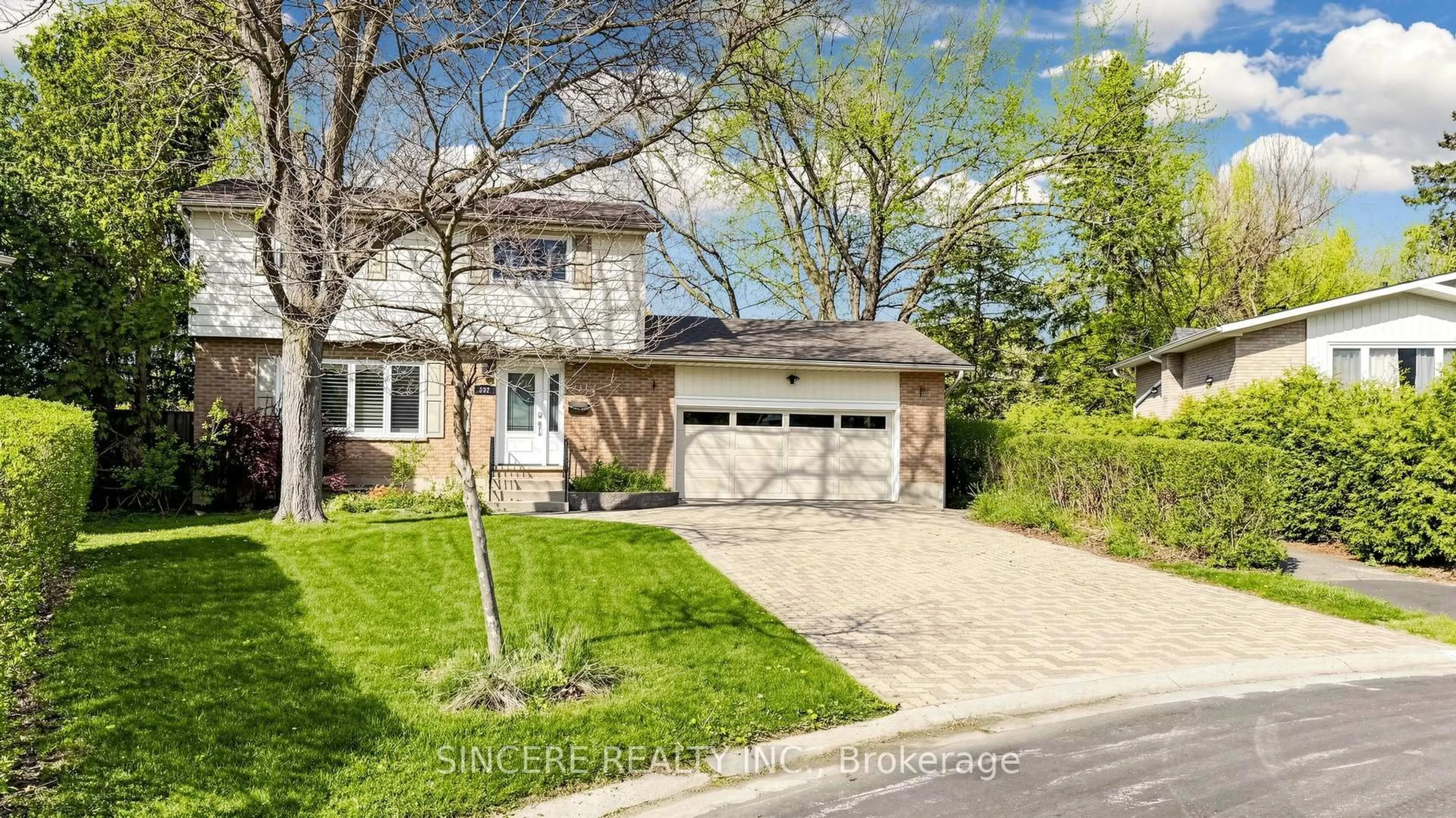 Home with brick exterior material, street for 592 Canewood Cres, Waterloo Ontario N2L 5P5