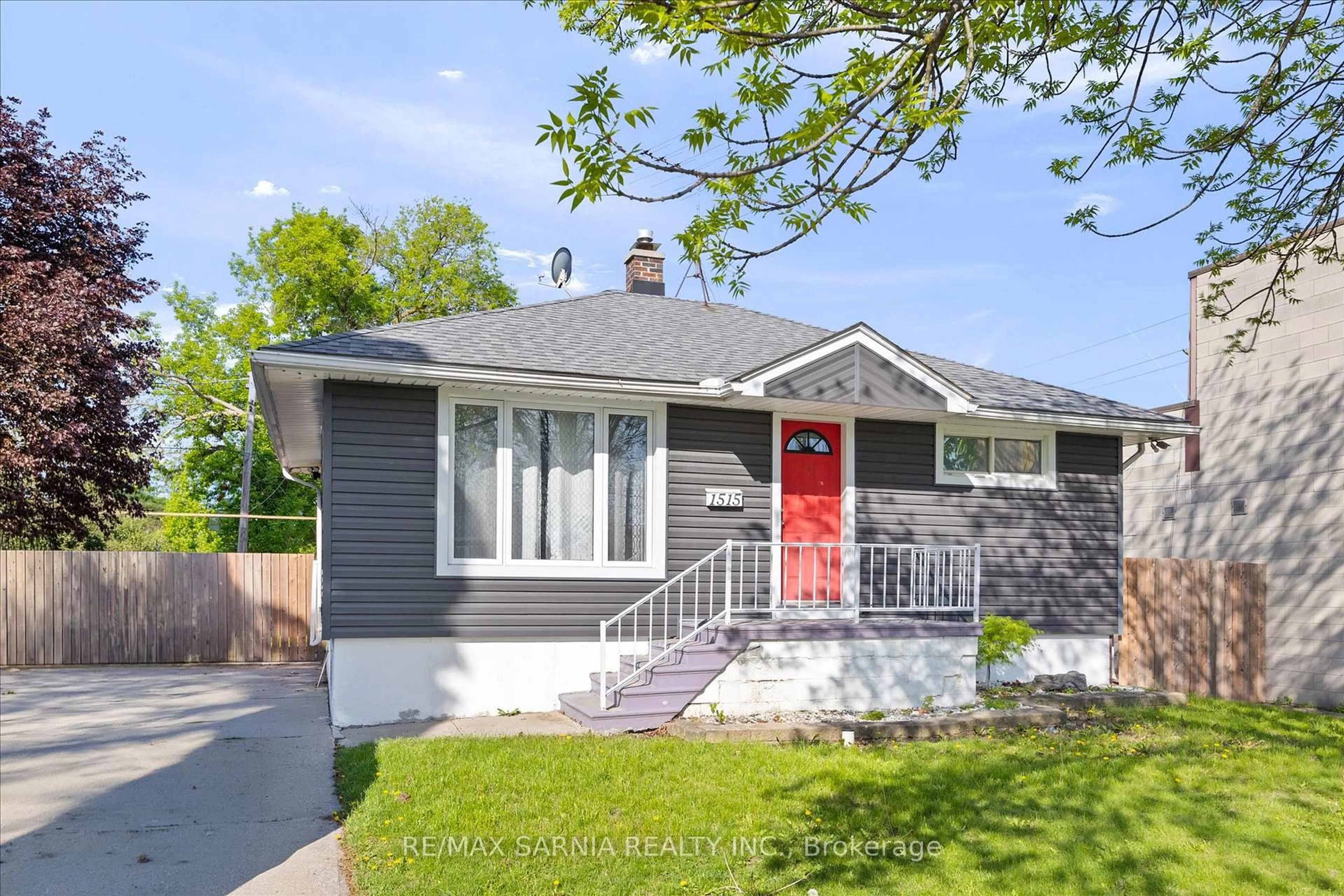 Home with vinyl exterior material, street for 1515 Tourangeau Rd, Windsor Ontario N8Y 4J5