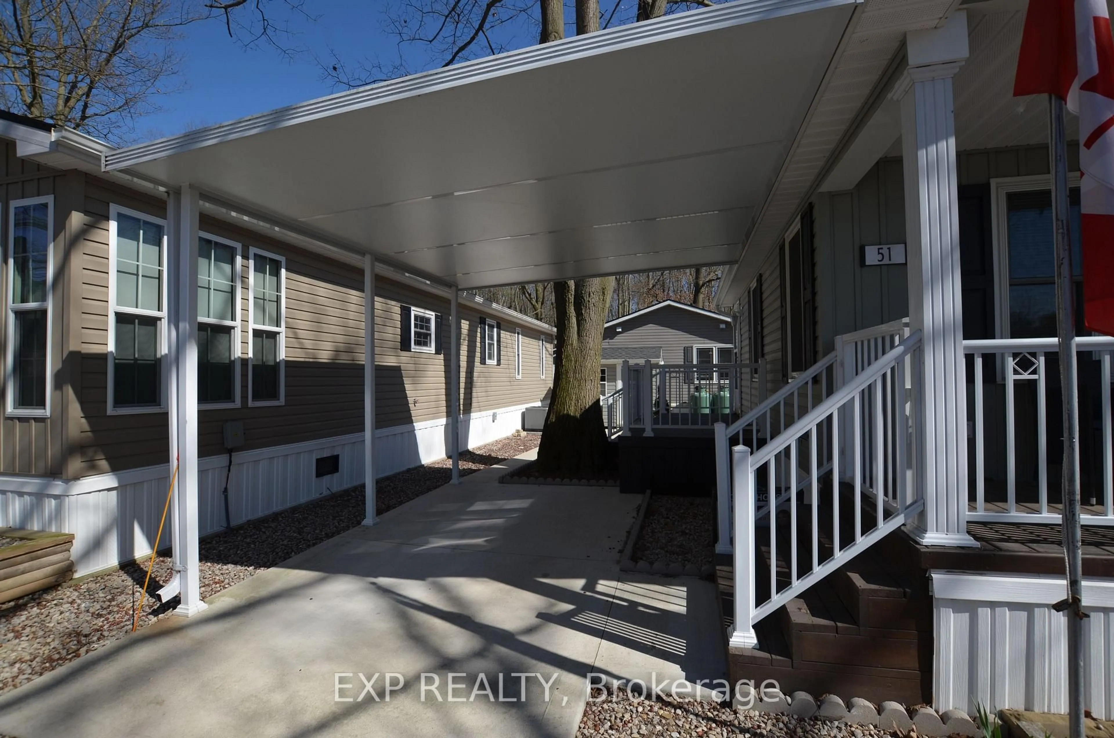 Home with vinyl exterior material, street for 22790 Amiens Rd #51, Middlesex Centre Ontario N0L 1R0
