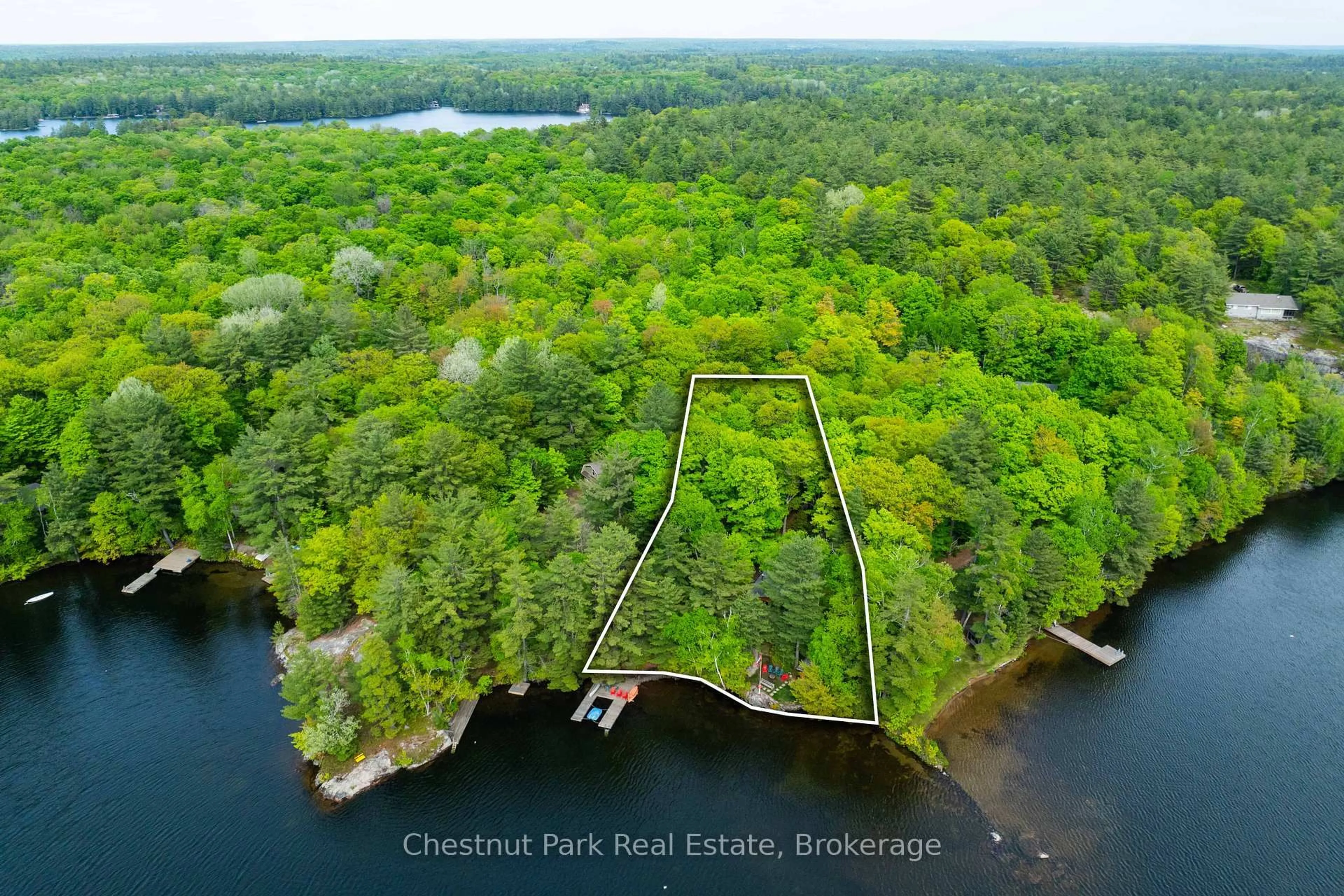 A pic from outside/outdoor area/front of a property/back of a property/a pic from drone, water/lake/river/ocean view for 6 Sundown Rd, Seguin Ontario P2A 2W8