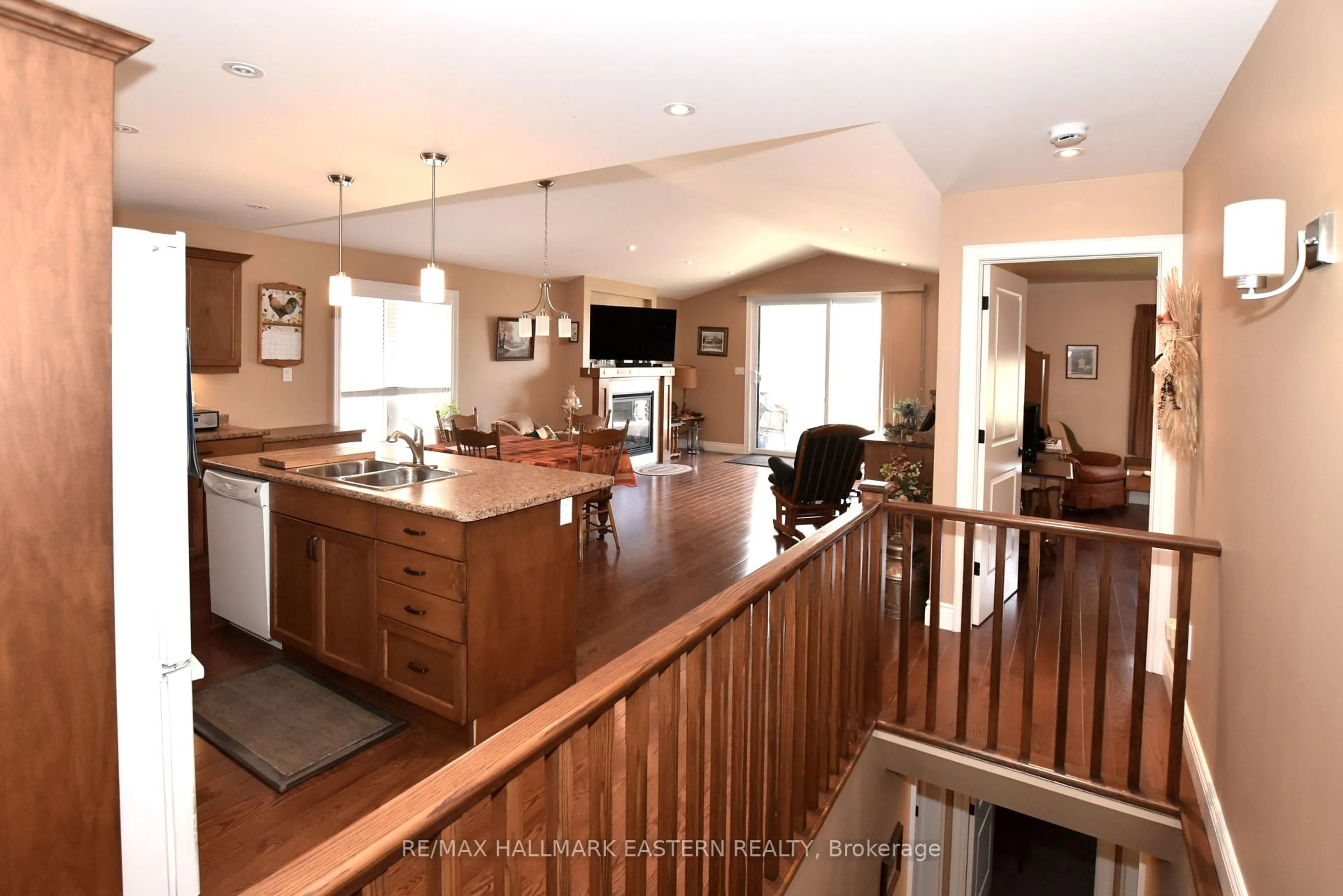 Open concept kitchen, wood/laminate floor for 428 Raymond St, Peterborough Ontario K9L 1R2