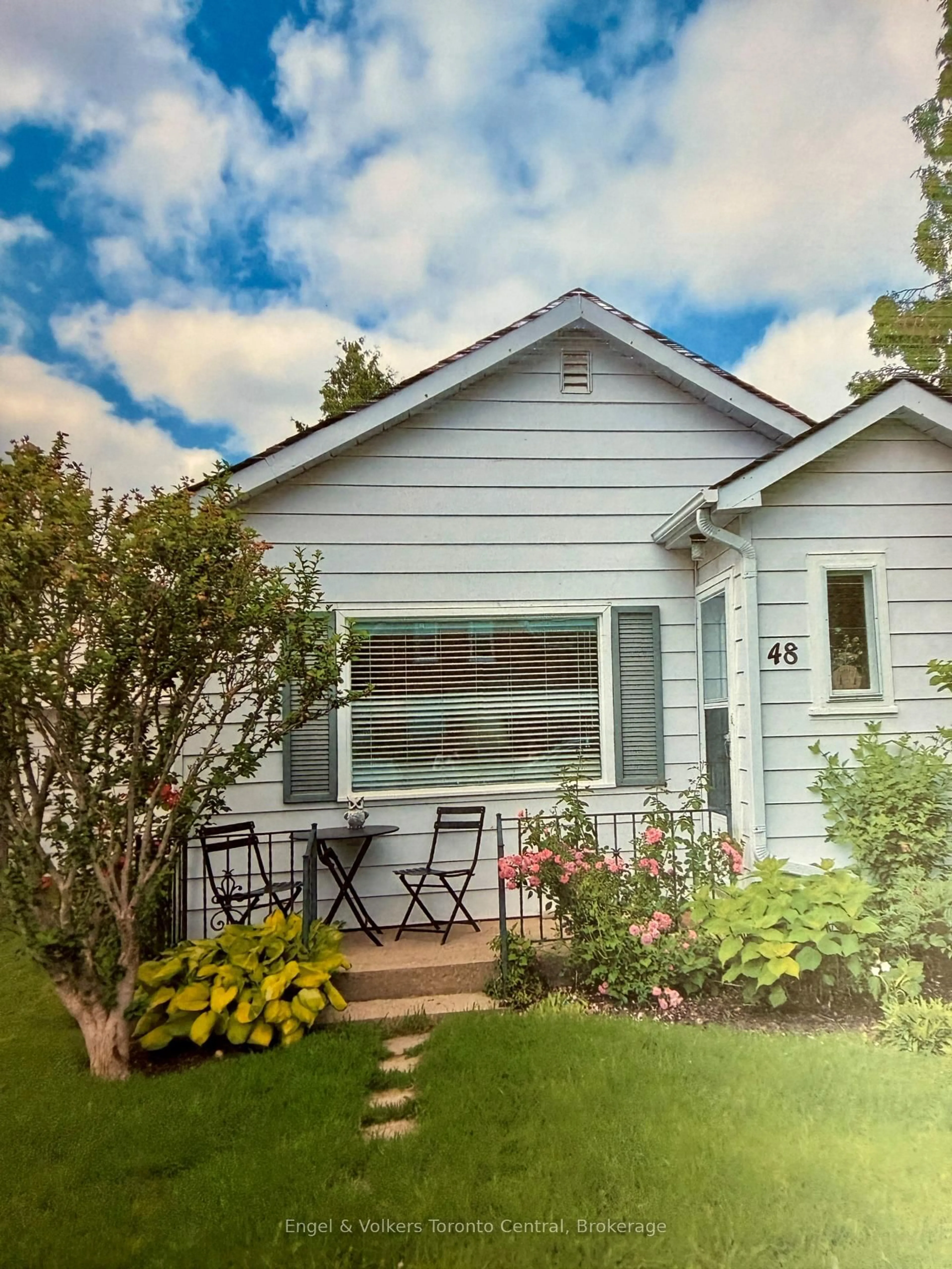 Home with vinyl exterior material, street for 48 Berry St, Meaford Ontario N4L 1G2