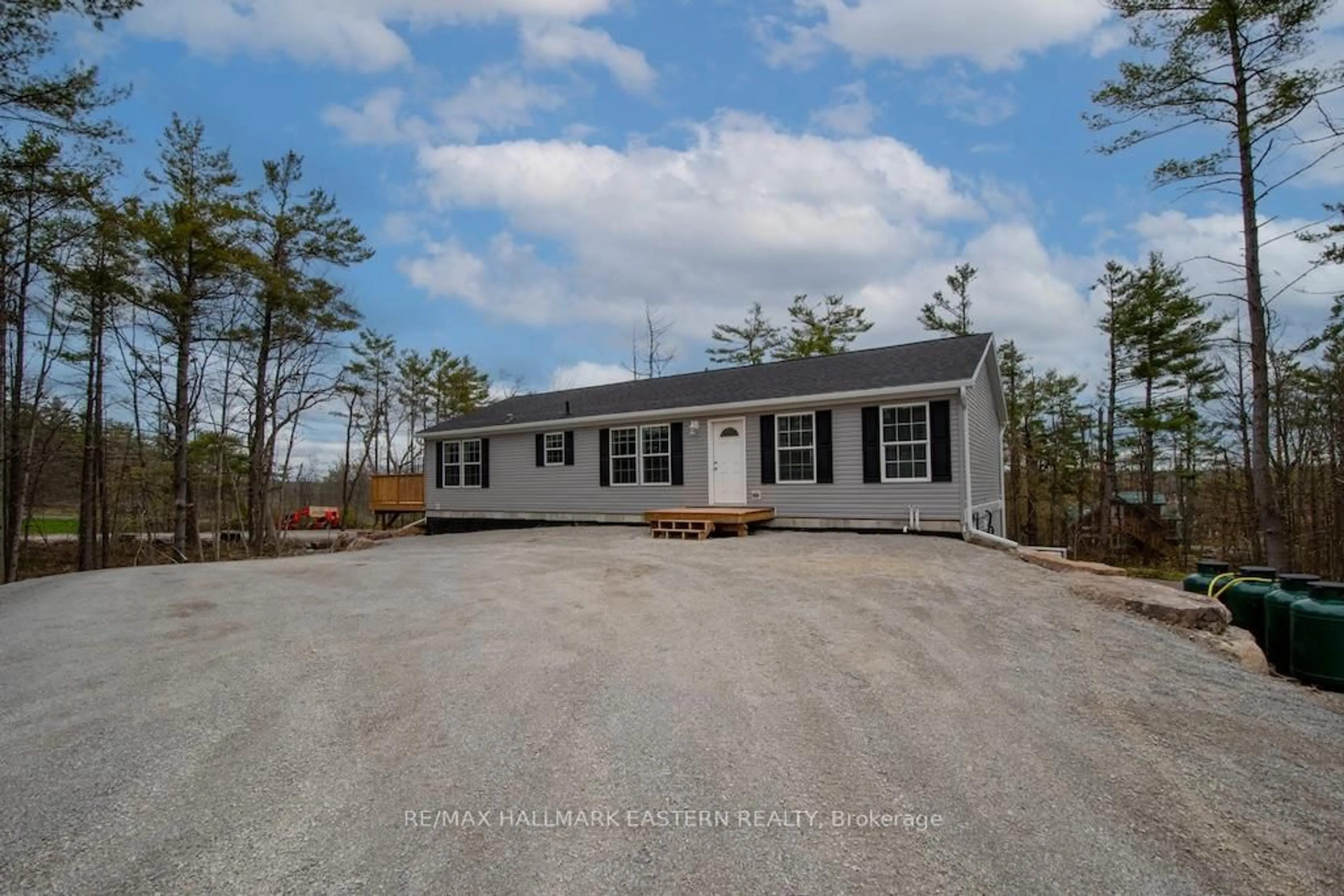 Home with vinyl exterior material, street for 1864 Lakehurst Rd, Trent Lakes Ontario K0L 1J0