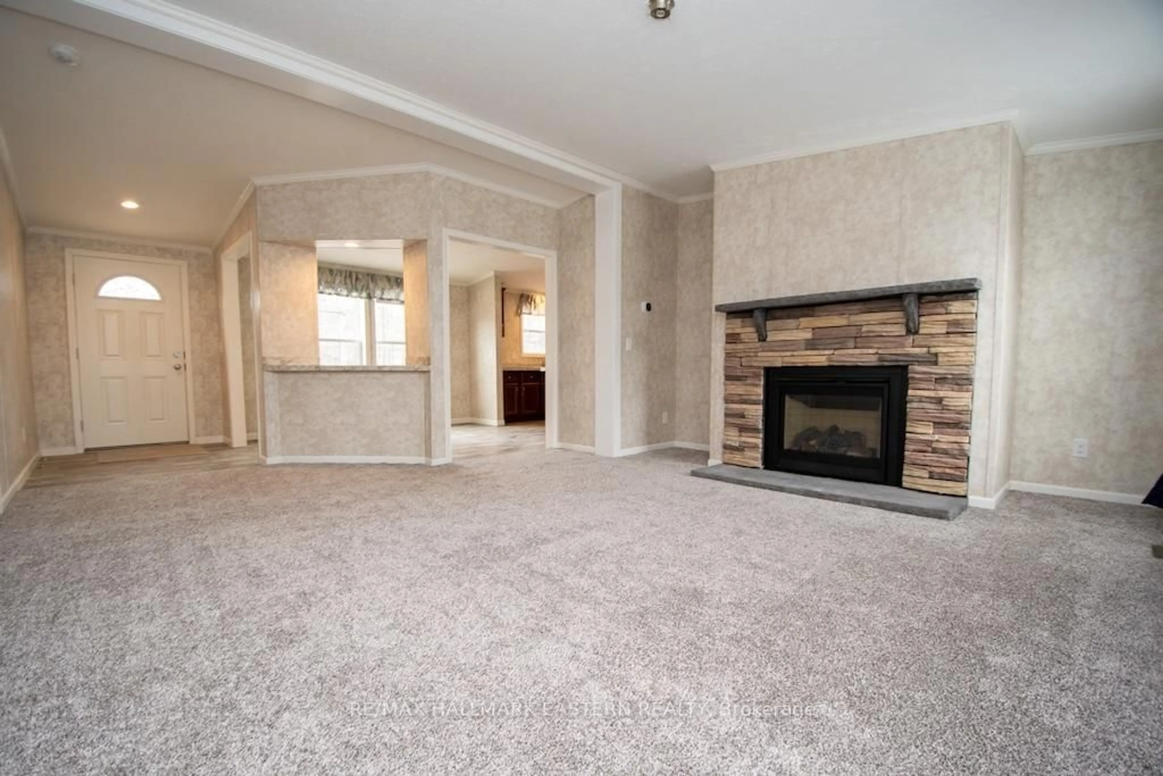 Living room with furniture, carpet floor for 1864 Lakehurst Rd, Trent Lakes Ontario K0L 1J0