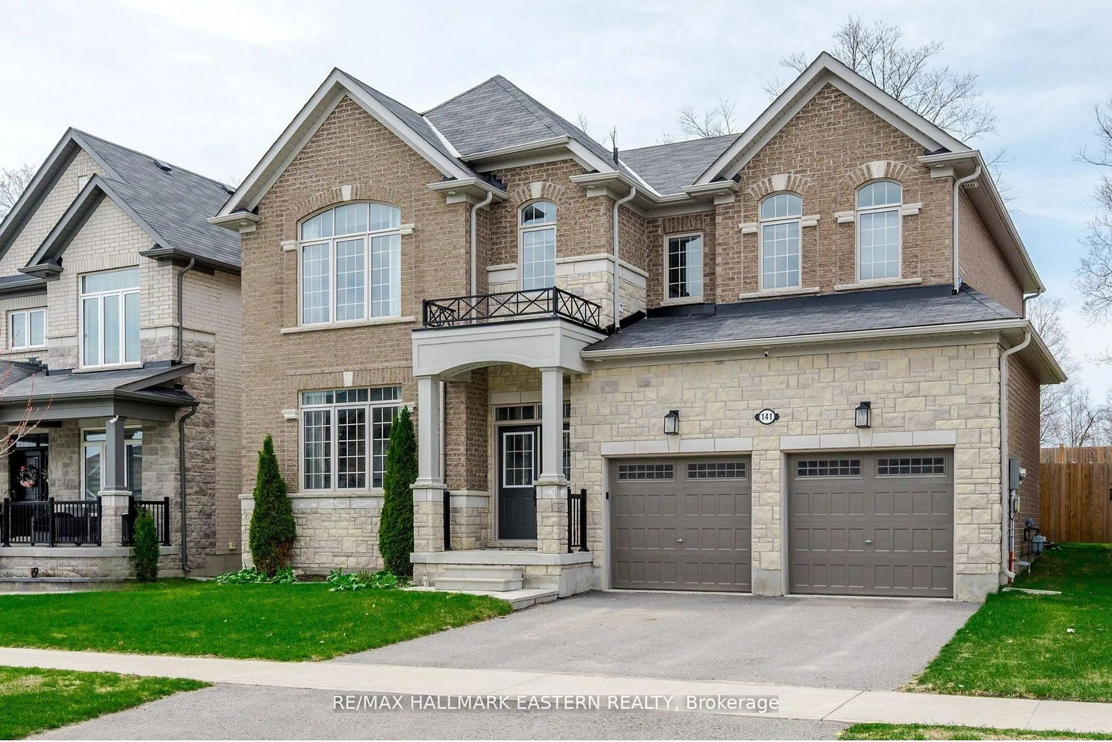 Home with brick exterior material, street for 141 Highlands Blvd, Cavan Monaghan Ontario L0A 1G0