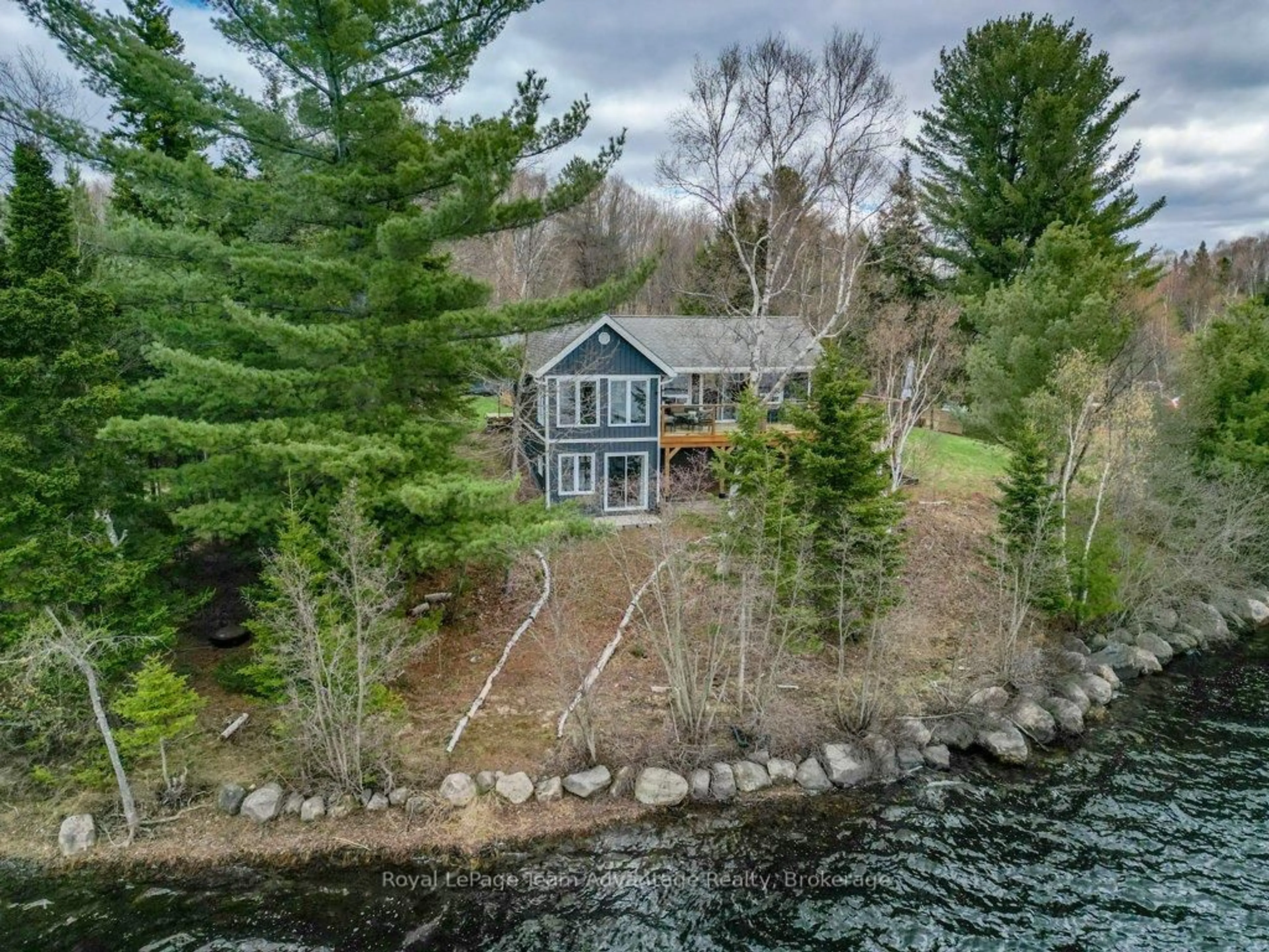 A pic from outside/outdoor area/front of a property/back of a property/a pic from drone, water/lake/river/ocean view for 134 Johnston Rd, Magnetawan Ontario P0A 1P0