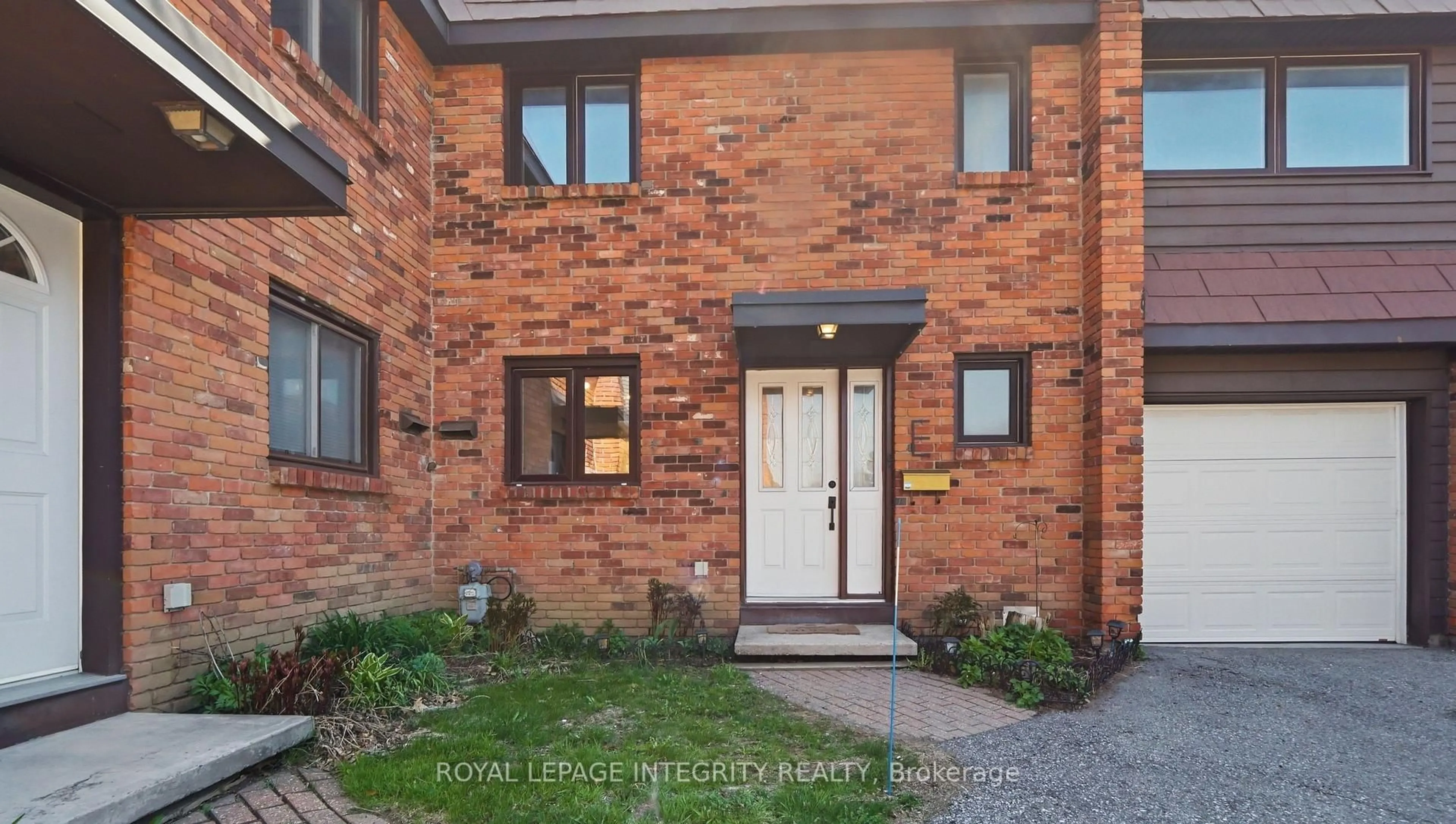 Home with brick exterior material, street for 3920 Old Richmond Rd #E, Ottawa Ontario K2H 5C6