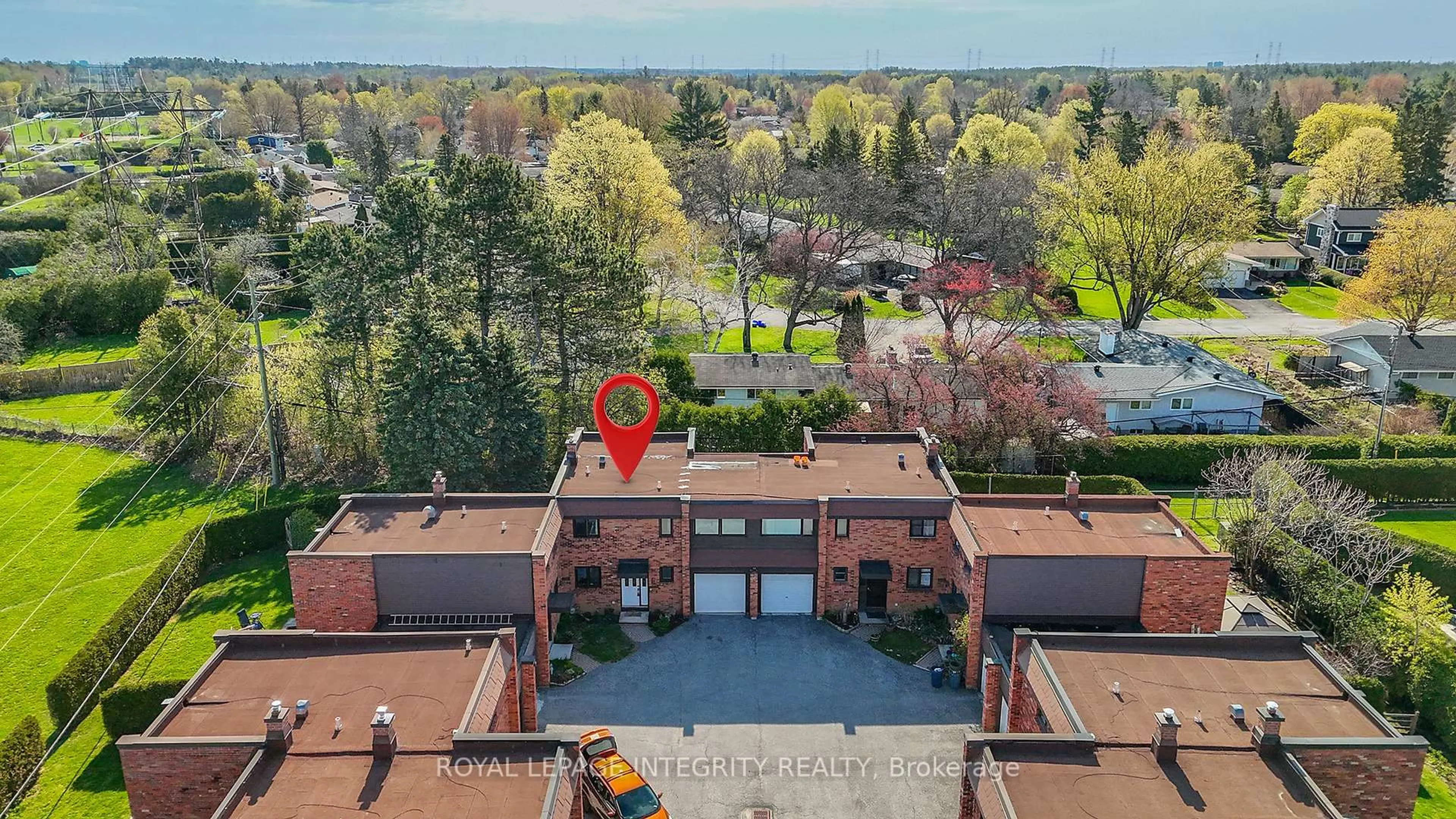 A pic from outside/outdoor area/front of a property/back of a property/a pic from drone, building for 3920 Old Richmond Rd #E, Ottawa Ontario K2H 5C6