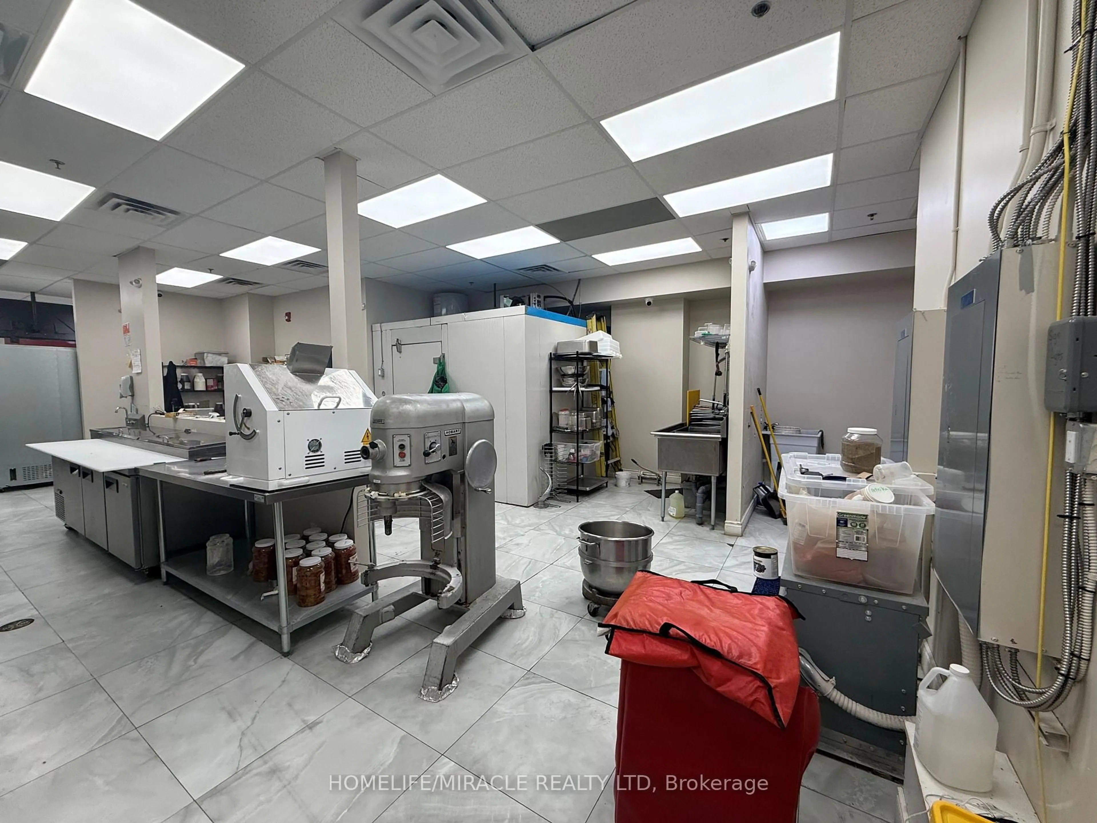 Kitchen with laundary machines, unknown for 60 Frederick St, Kitchener Ontario N2H 0C7