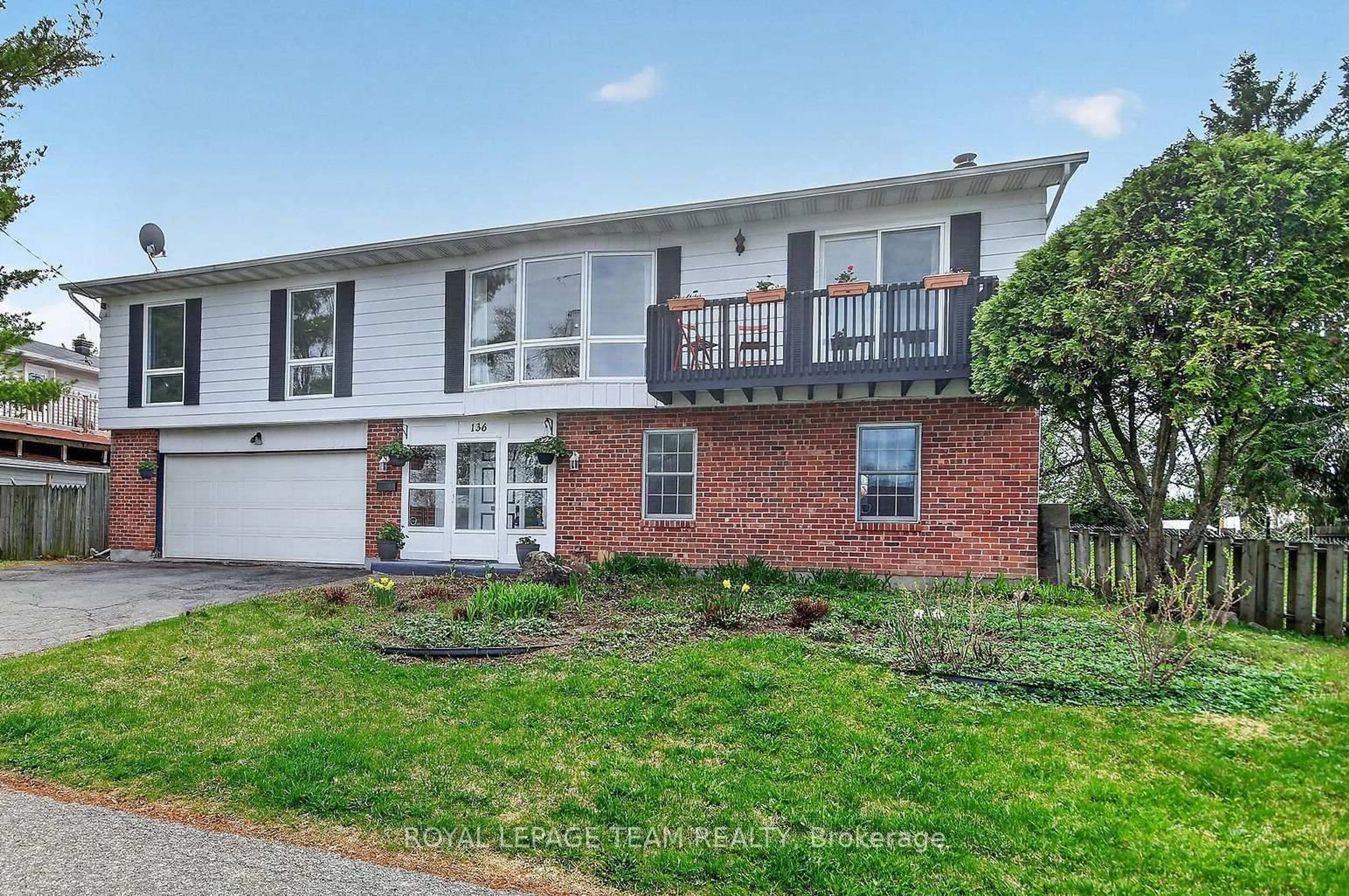 Home with brick exterior material, street for 136 James Cummings Ave, Ottawa Ontario K2H 8E1