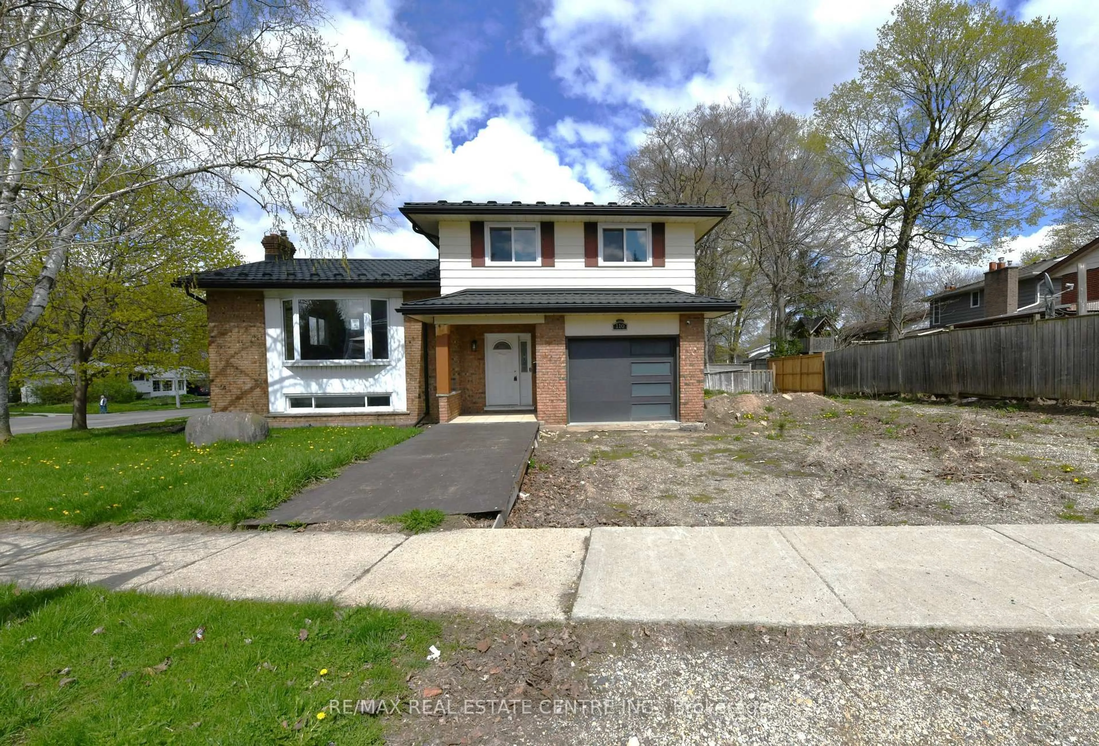 Home with brick exterior material, street for 110 Silverspring Cres, Kitchener Ontario N2M 4P4