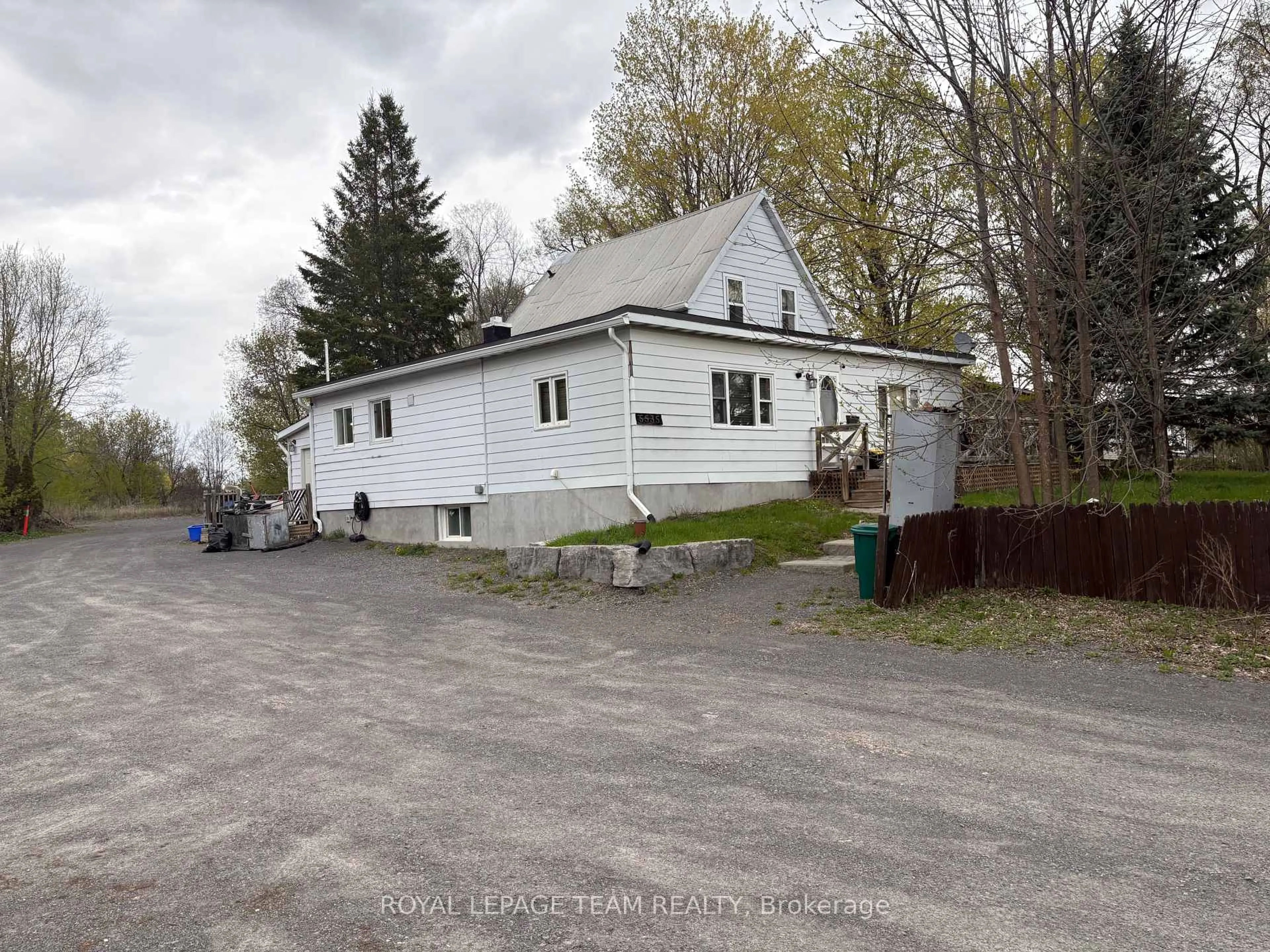 A pic from outside/outdoor area/front of a property/back of a property/a pic from drone, building for 5535 Mitch Owens Rd, Ottawa Ontario K1X 1C2