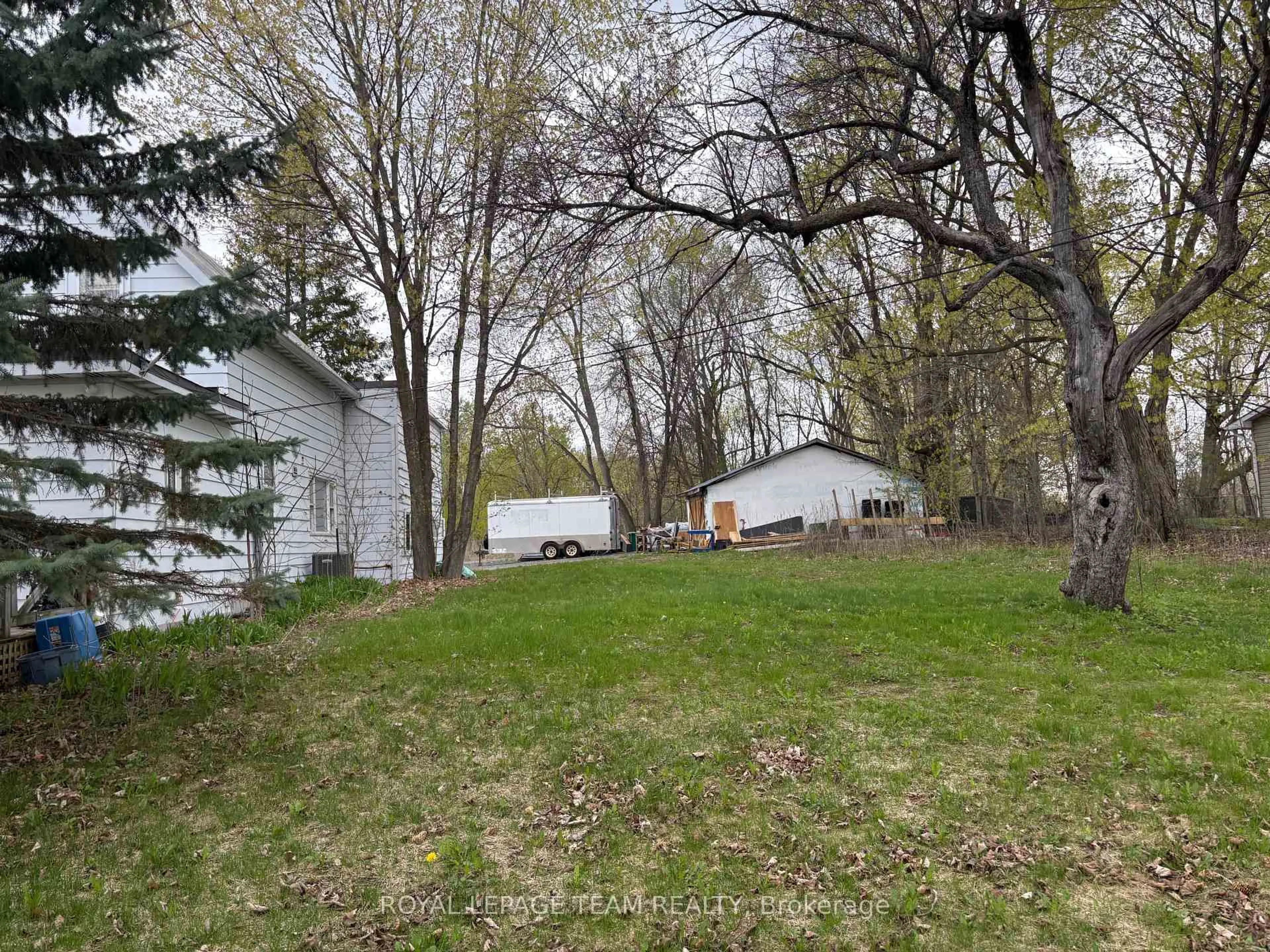 A pic from outside/outdoor area/front of a property/back of a property/a pic from drone, forest/trees view for 5535 Mitch Owens Rd, Ottawa Ontario K1X 1C2