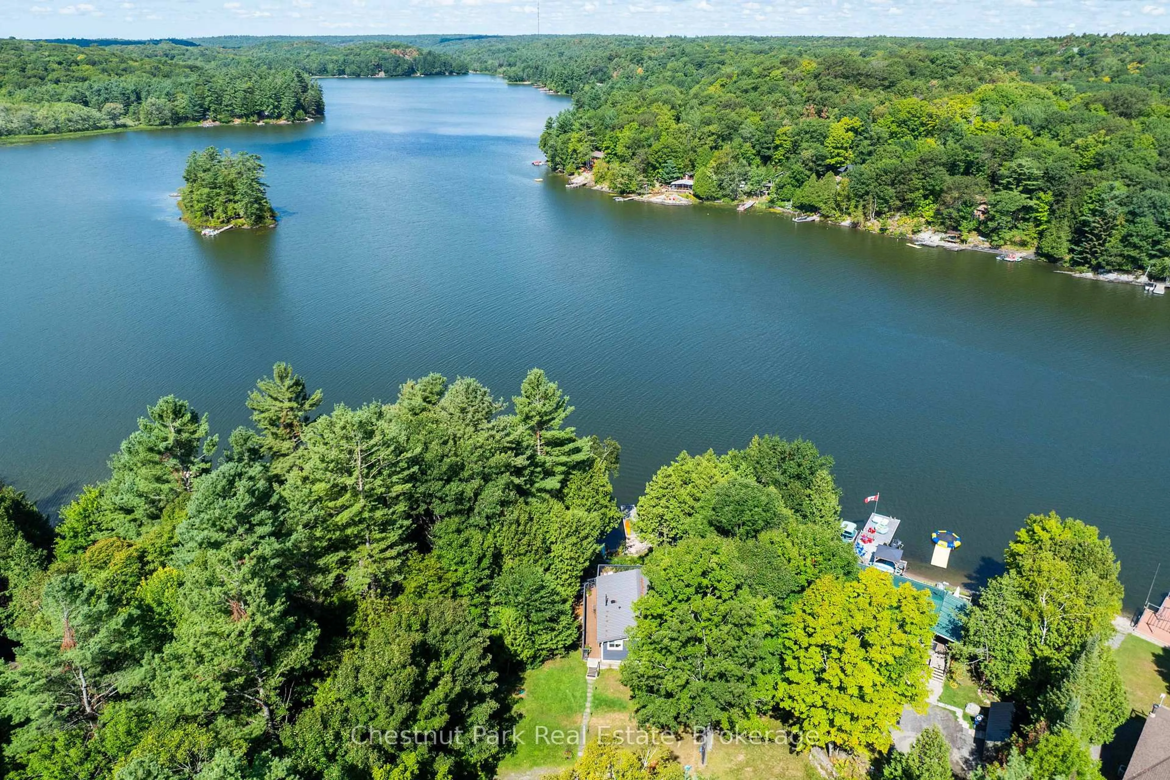 A pic from outside/outdoor area/front of a property/back of a property/a pic from drone, water/lake/river/ocean view for 1140 Cowan Park Rd #8, Muskoka Lakes Ontario P0B 1M0