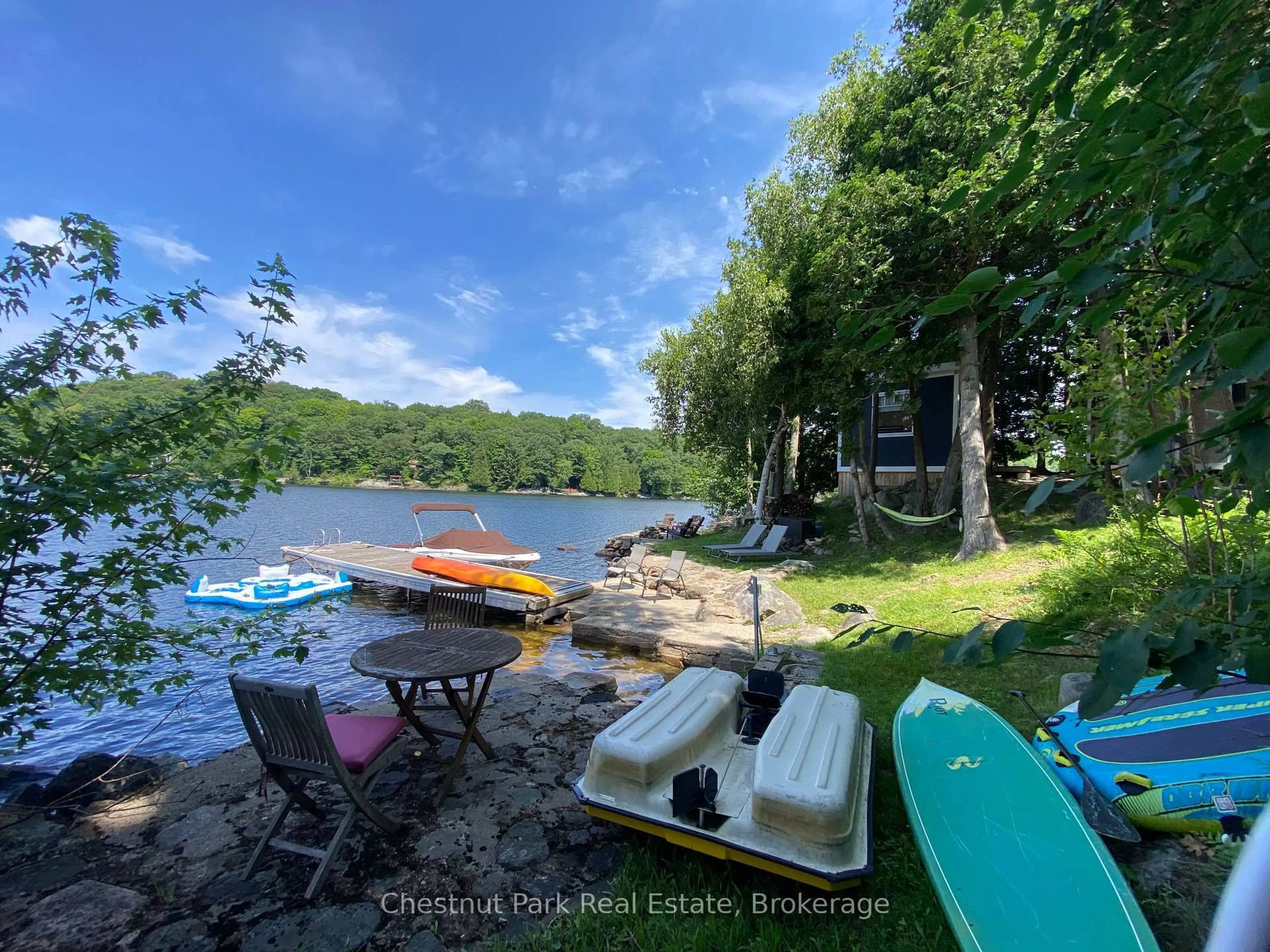 A pic from outside/outdoor area/front of a property/back of a property/a pic from drone, water/lake/river/ocean view for 1140 Cowan Park Rd #8, Muskoka Lakes Ontario P0B 1M0