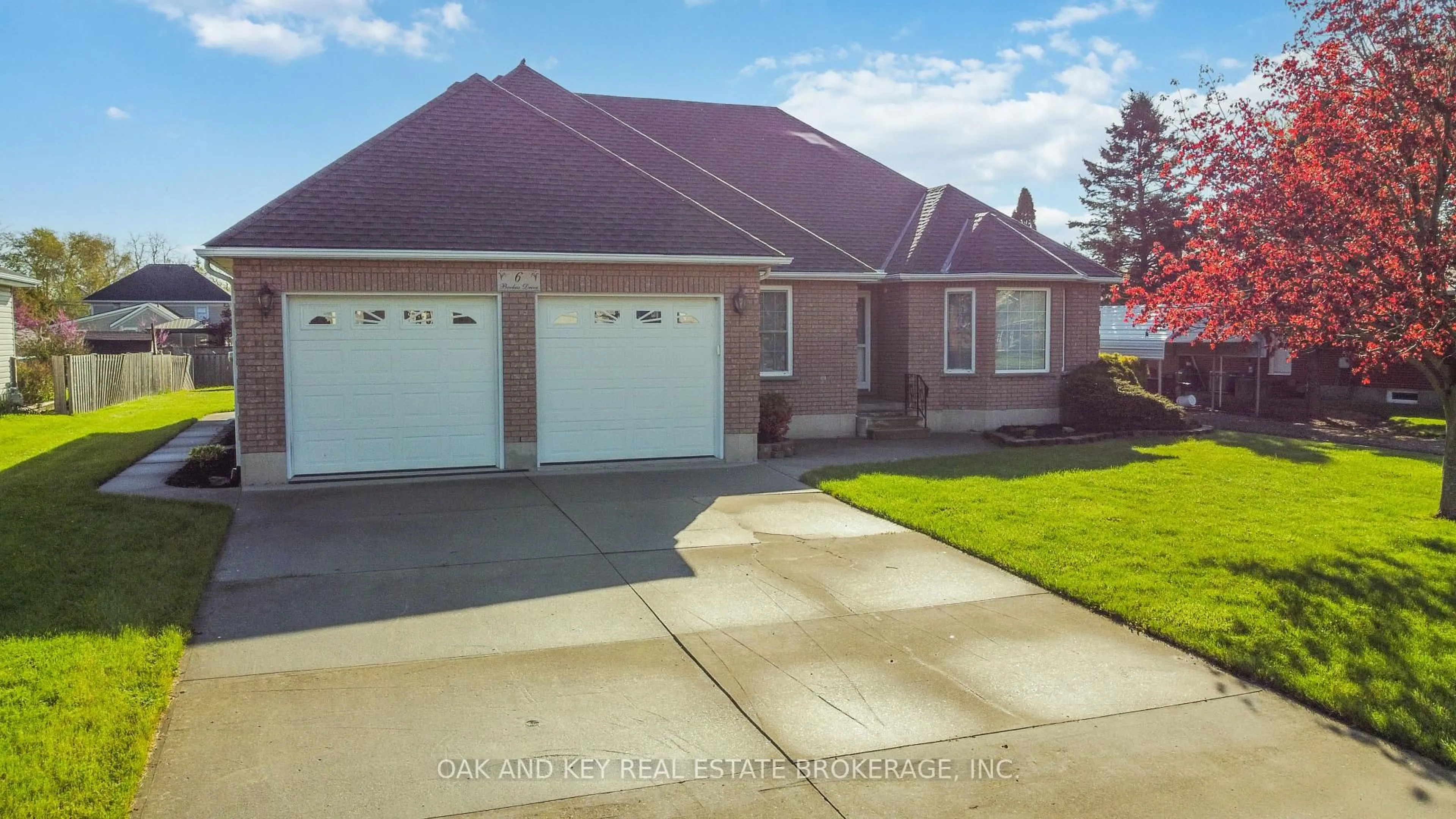 Home with vinyl exterior material, street for 6 Backus Dr, Norfolk Ontario N0E 1M0