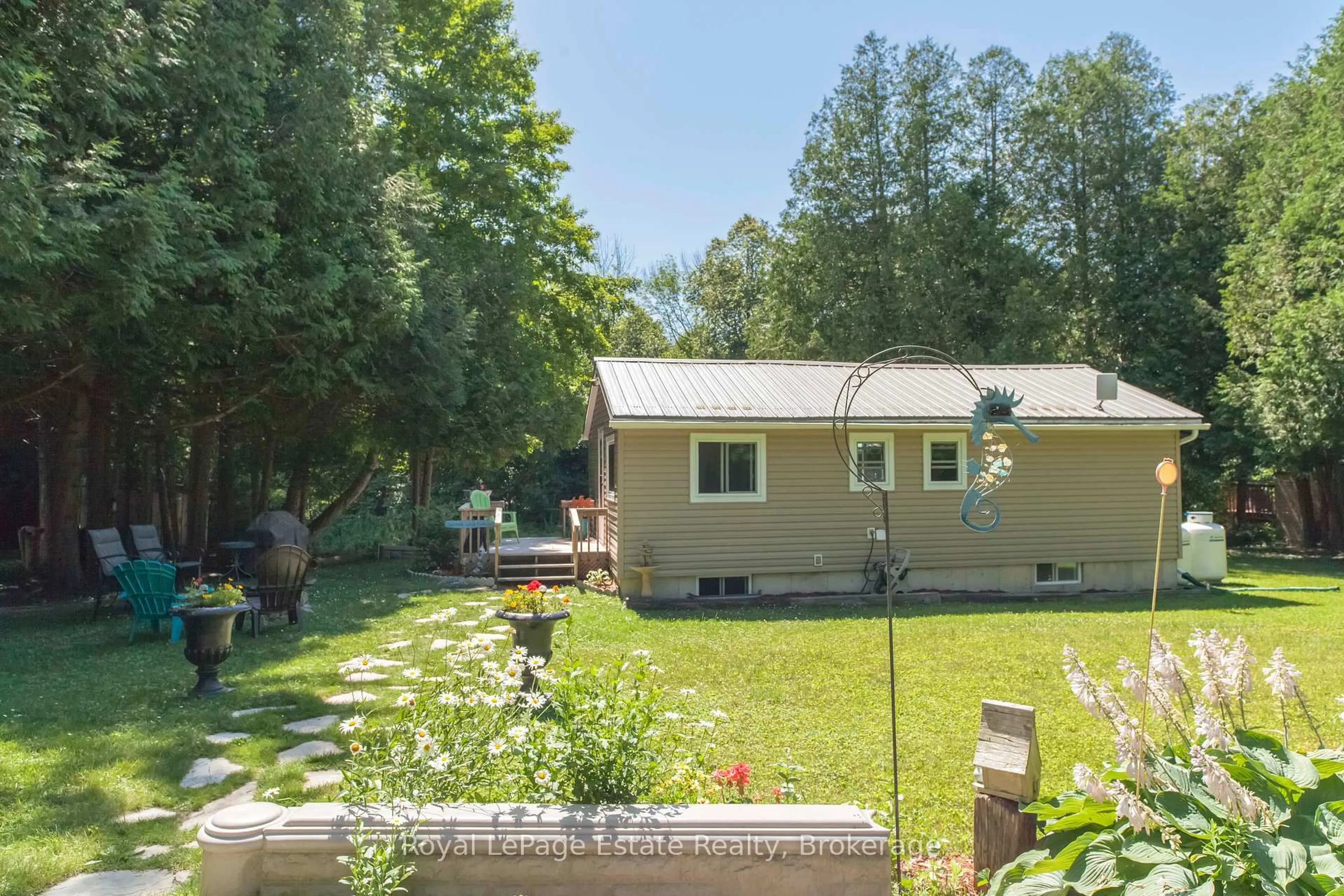 A pic from outside/outdoor area/front of a property/back of a property/a pic from drone, street for 50 Roger's Cres, South Bruce Peninsula Ontario N0H 1P0