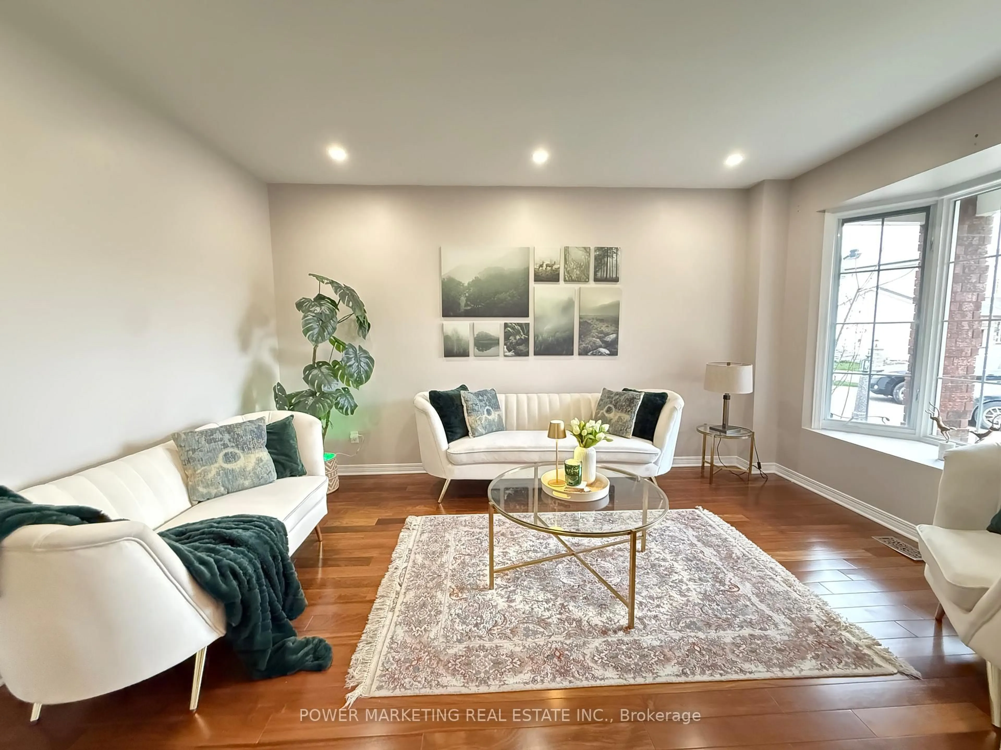 Living room with furniture, wood/laminate floor for 22 New Deighton Cres, Ottawa Ontario K2G 6H6