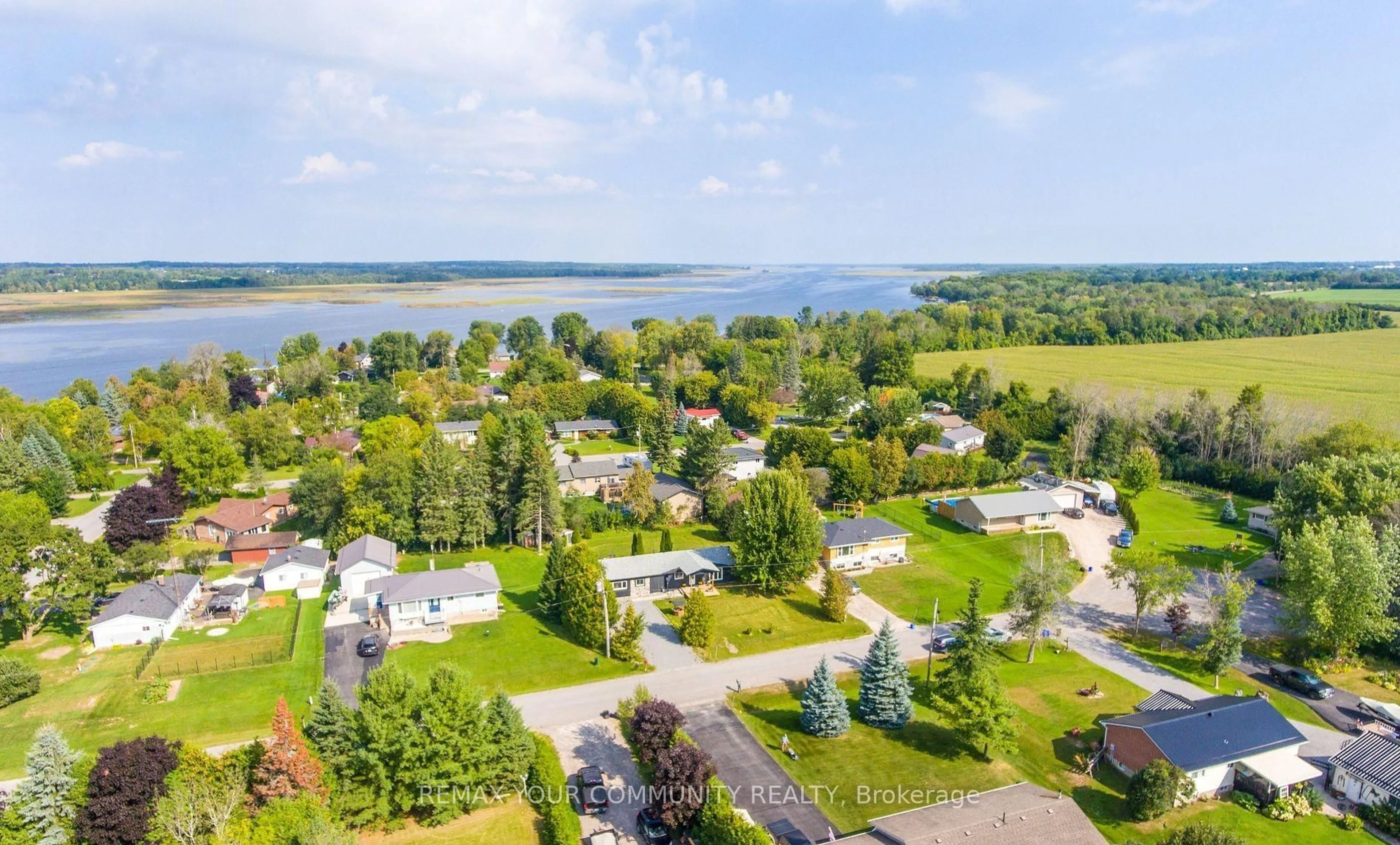 A pic from outside/outdoor area/front of a property/back of a property/a pic from drone, water/lake/river/ocean view for 9 Emily Crt, Kawartha Lakes Ontario K0L 2W0