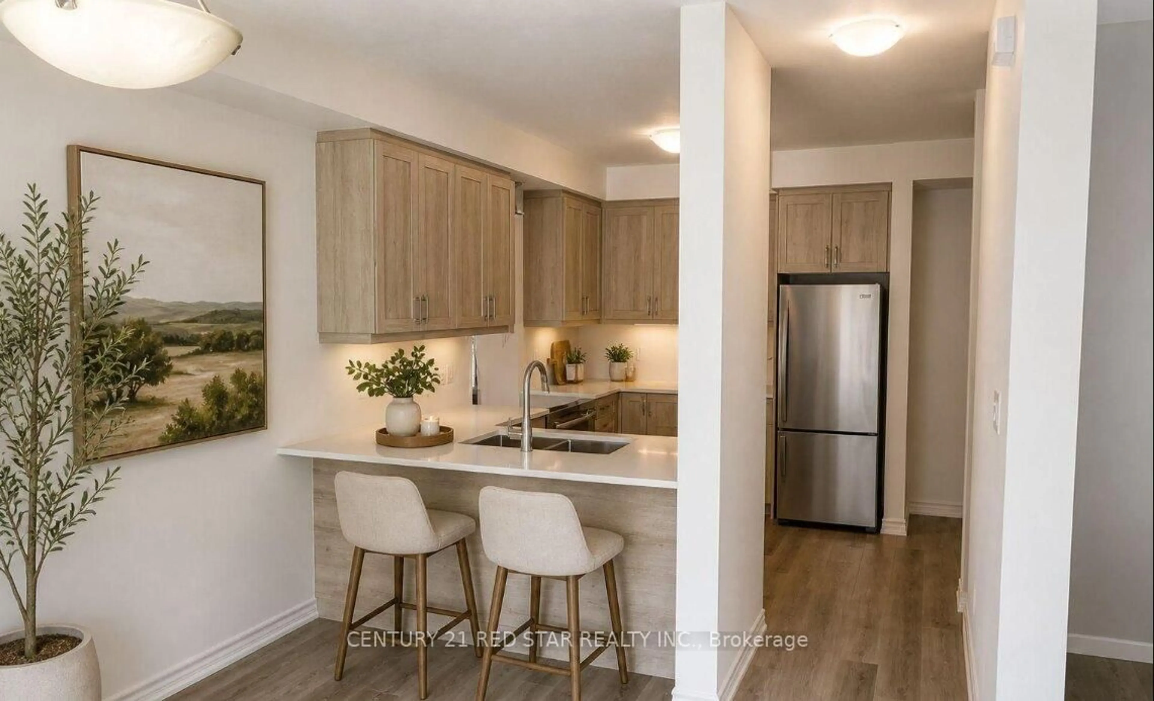 Open concept kitchen, wood/laminate floor for 461 Blackburn Dr #102, Brantford Ontario N3T 0W9