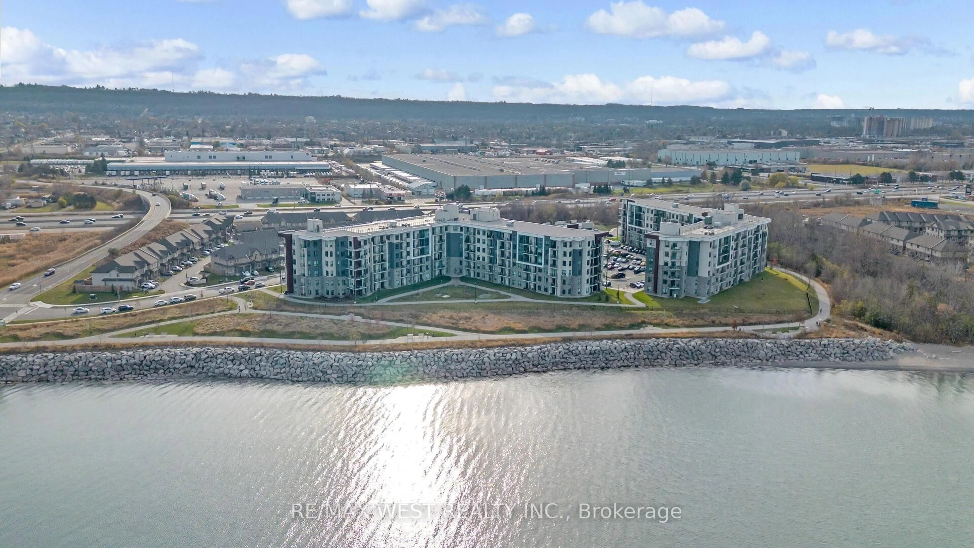 A pic from outside/outdoor area/front of a property/back of a property/a pic from drone, water/lake/river/ocean view for 101 Shoreview Pl #131, Hamilton Ontario L8E 0K2