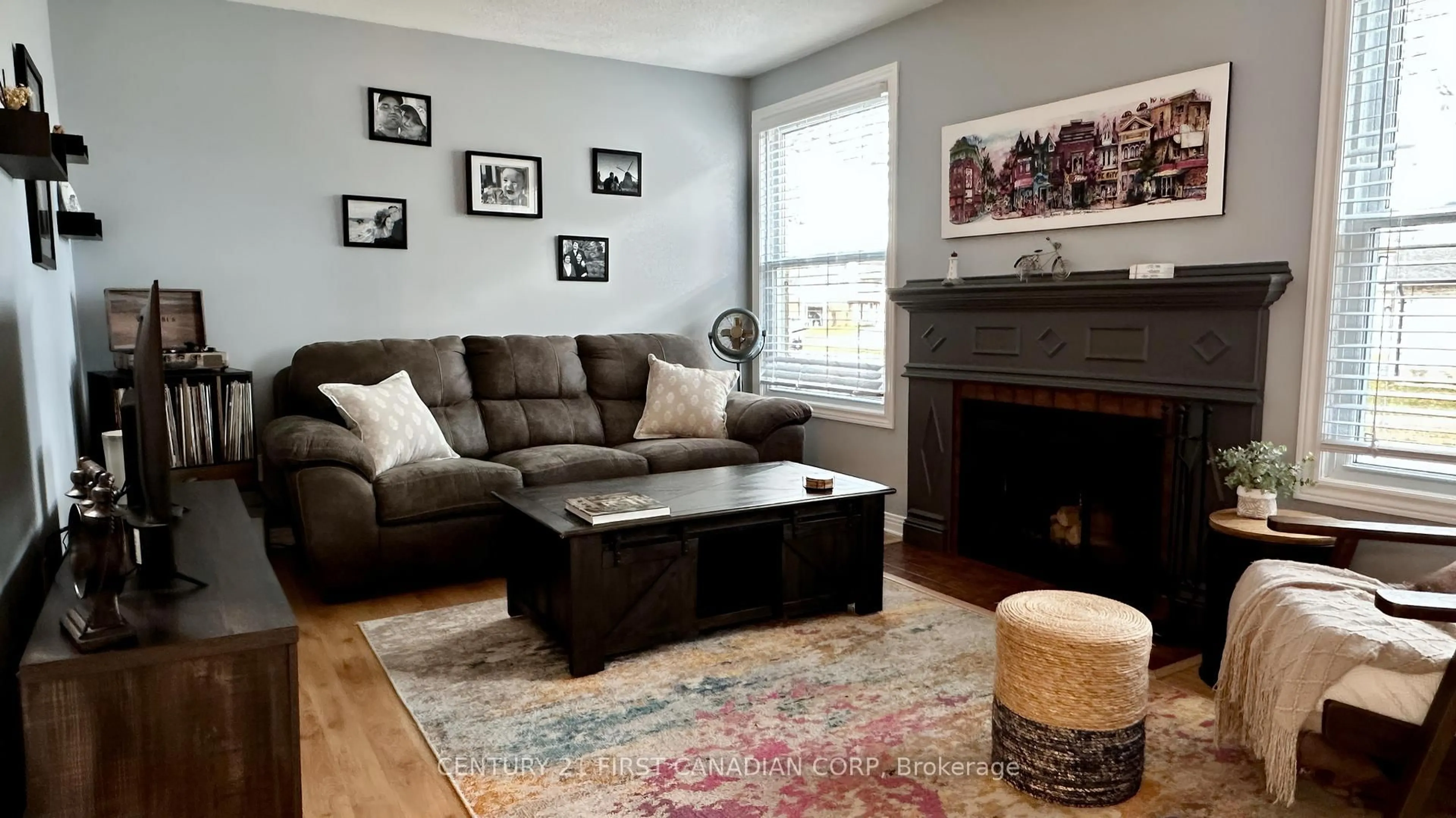 Living room with furniture, wood/laminate floor for 15 Chancton Cres, London South Ontario N6E 2Y5
