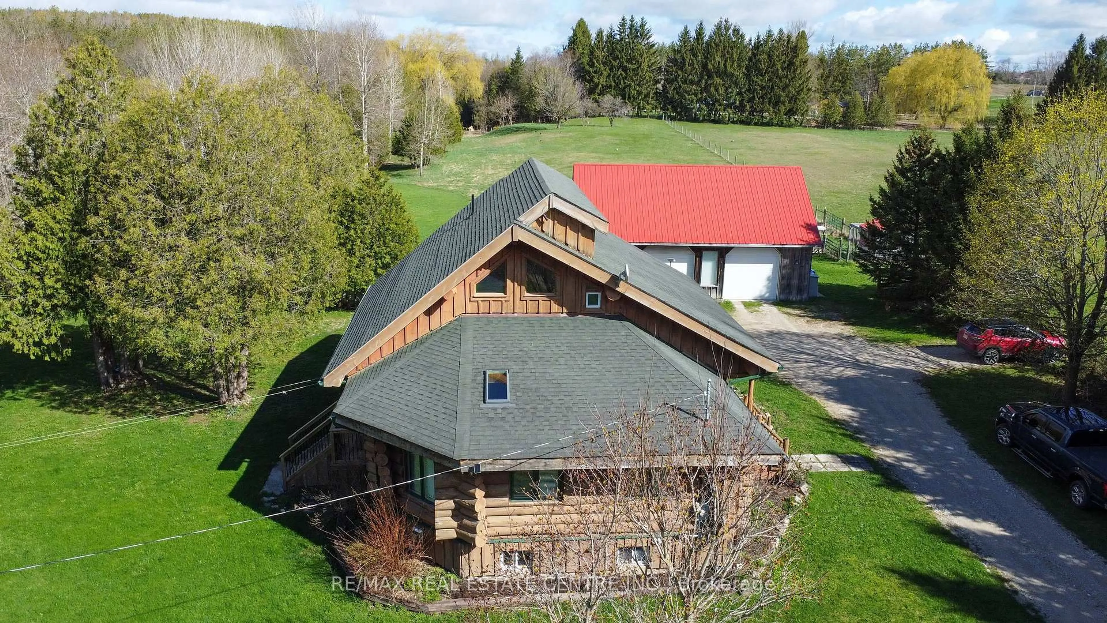A pic from outside/outdoor area/front of a property/back of a property/a pic from drone, building for 312302 6 Highway, West Grey Ontario N0G 1C0