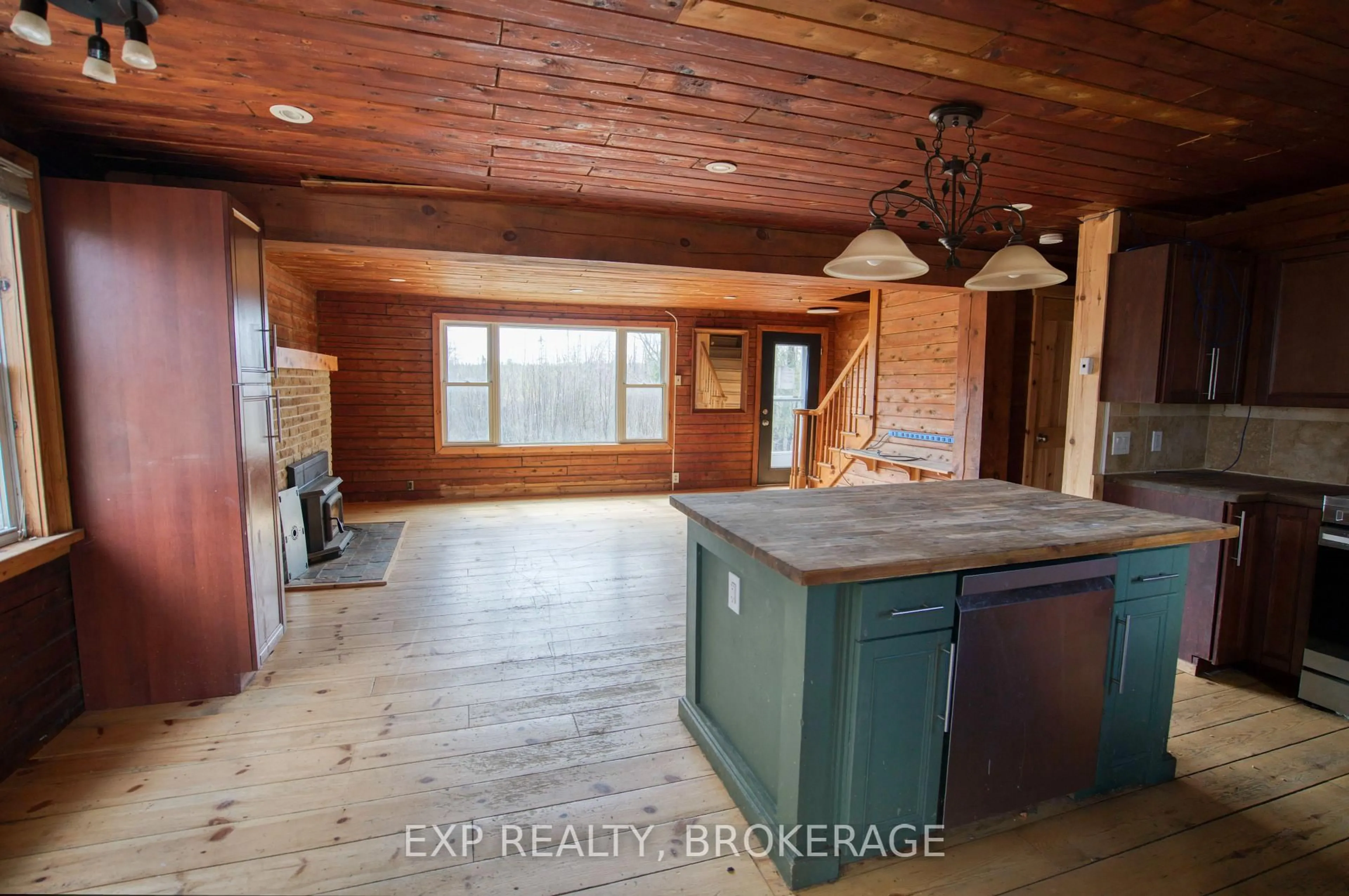 Open concept kitchen, wood/laminate floor for 1108 Veley Rd, Arden Ontario K0H 1B0