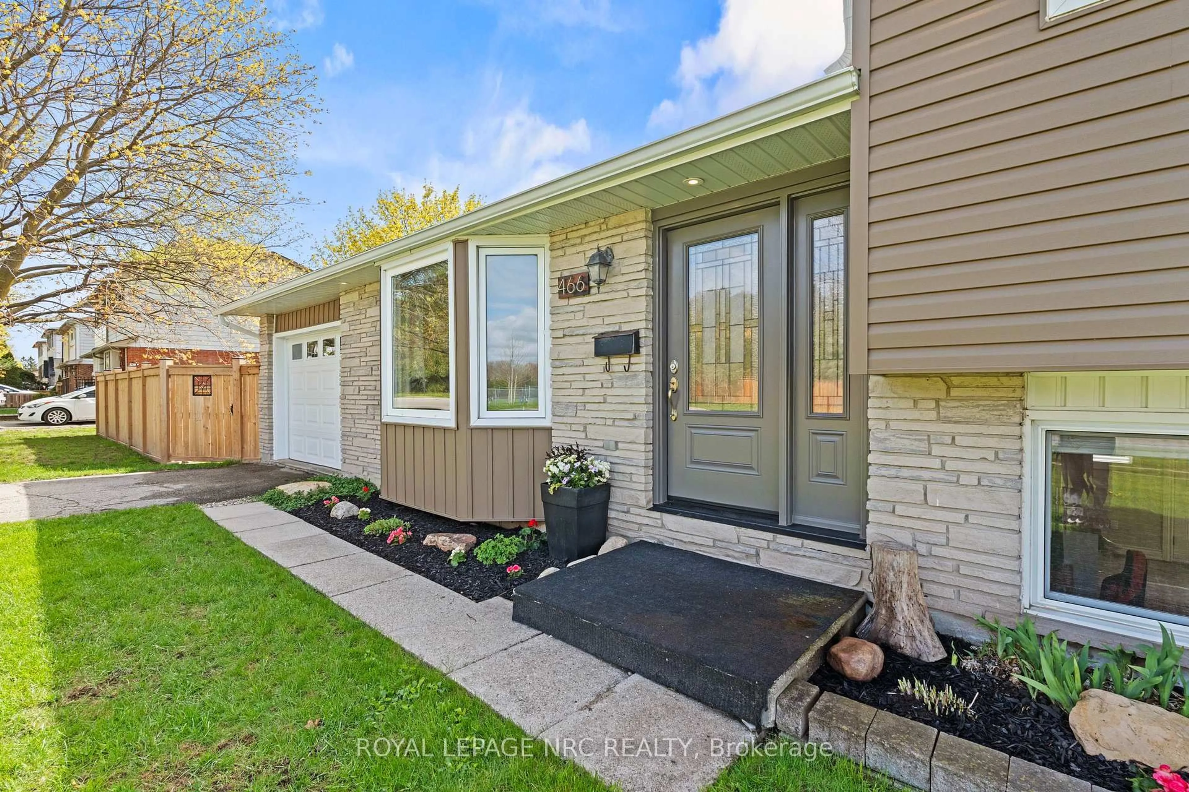 Home with brick exterior material, street for 466 Willow Rd, Guelph Ontario N1H 6S2