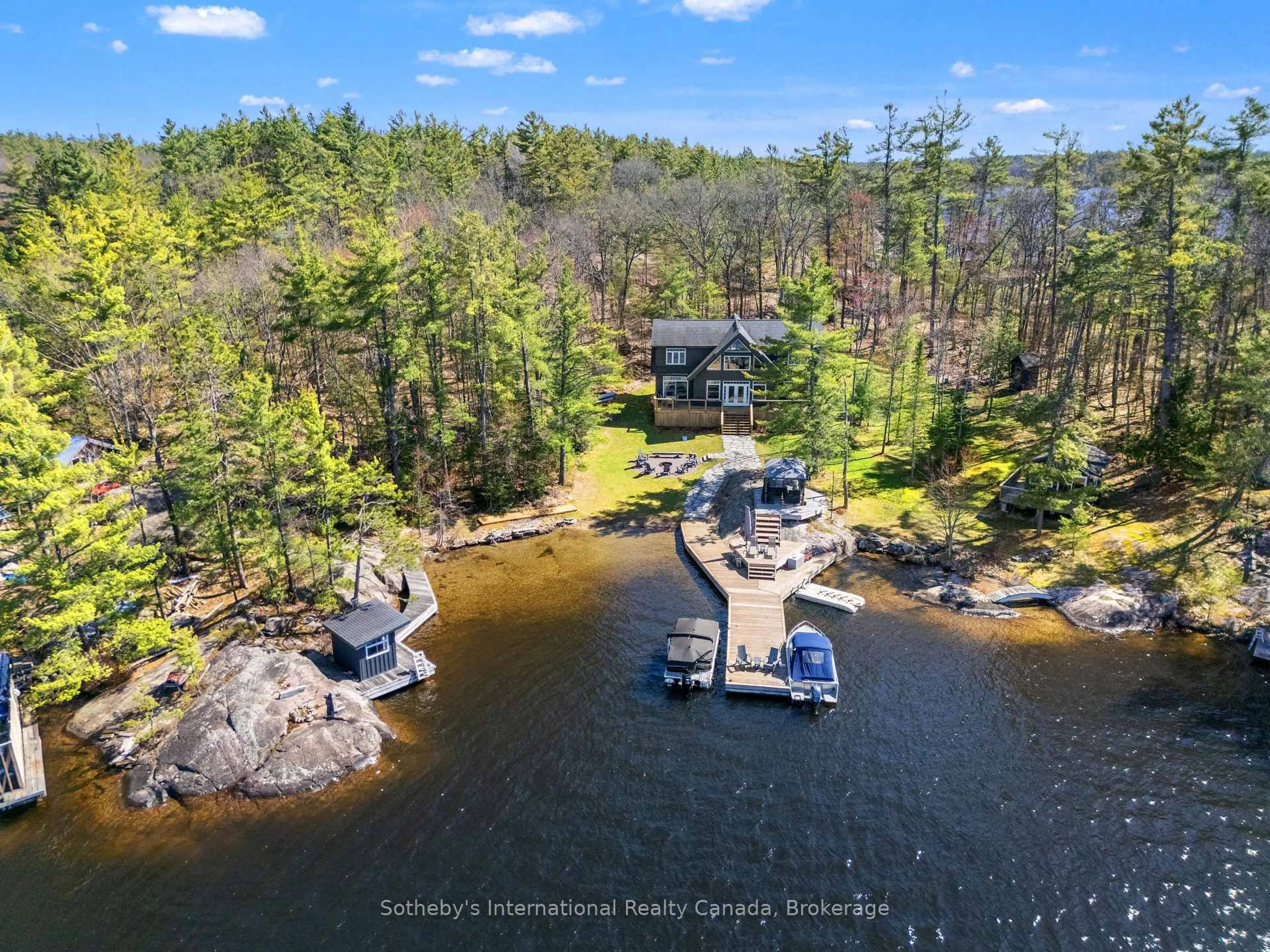 A pic from outside/outdoor area/front of a property/back of a property/a pic from drone, water/lake/river/ocean view for 2542 Go Home Lake Shore, Georgian Bay Ontario L0K 1S0