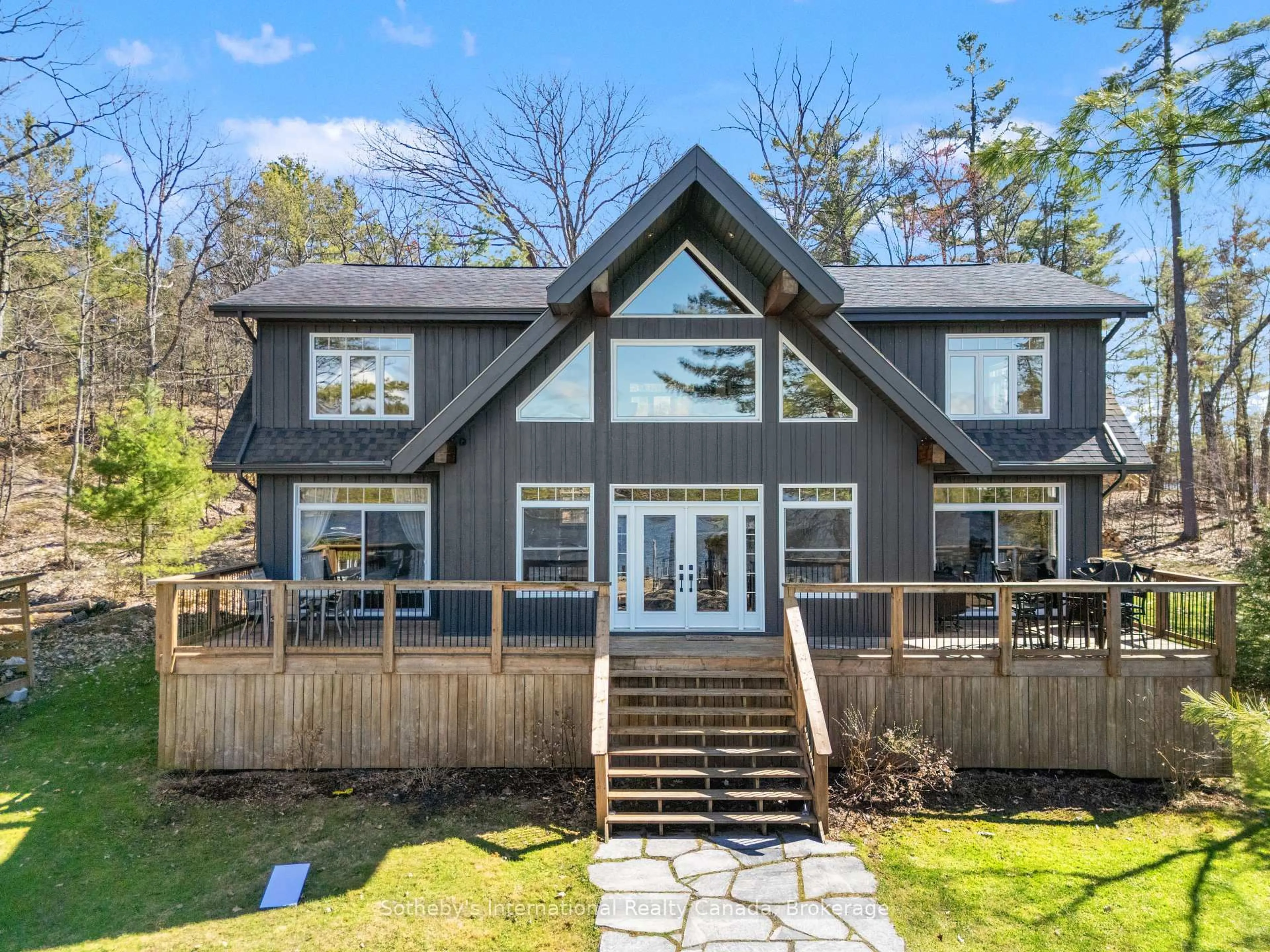 Home with vinyl exterior material, water/lake/river/ocean view for 2542 Go Home Lake Shore, Georgian Bay Ontario L0K 1S0