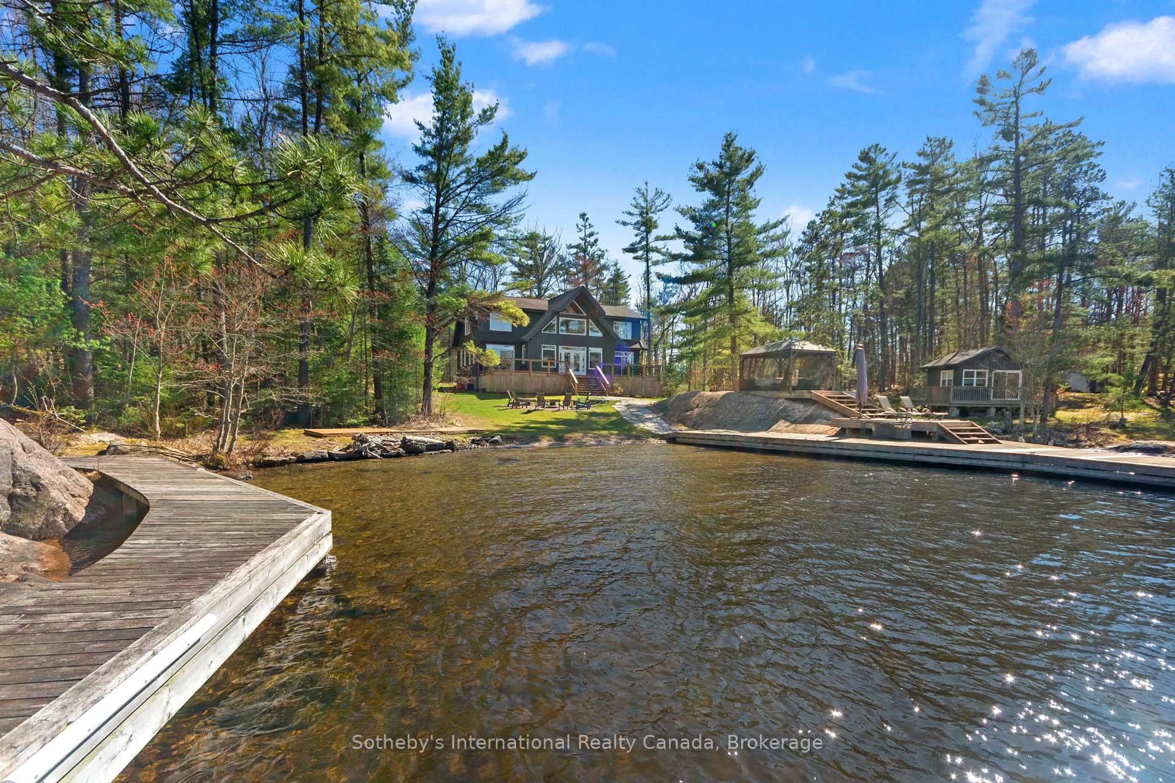 A pic from outside/outdoor area/front of a property/back of a property/a pic from drone, water/lake/river/ocean view for 2542 Go Home Lake Shore, Georgian Bay Ontario L0K 1S0