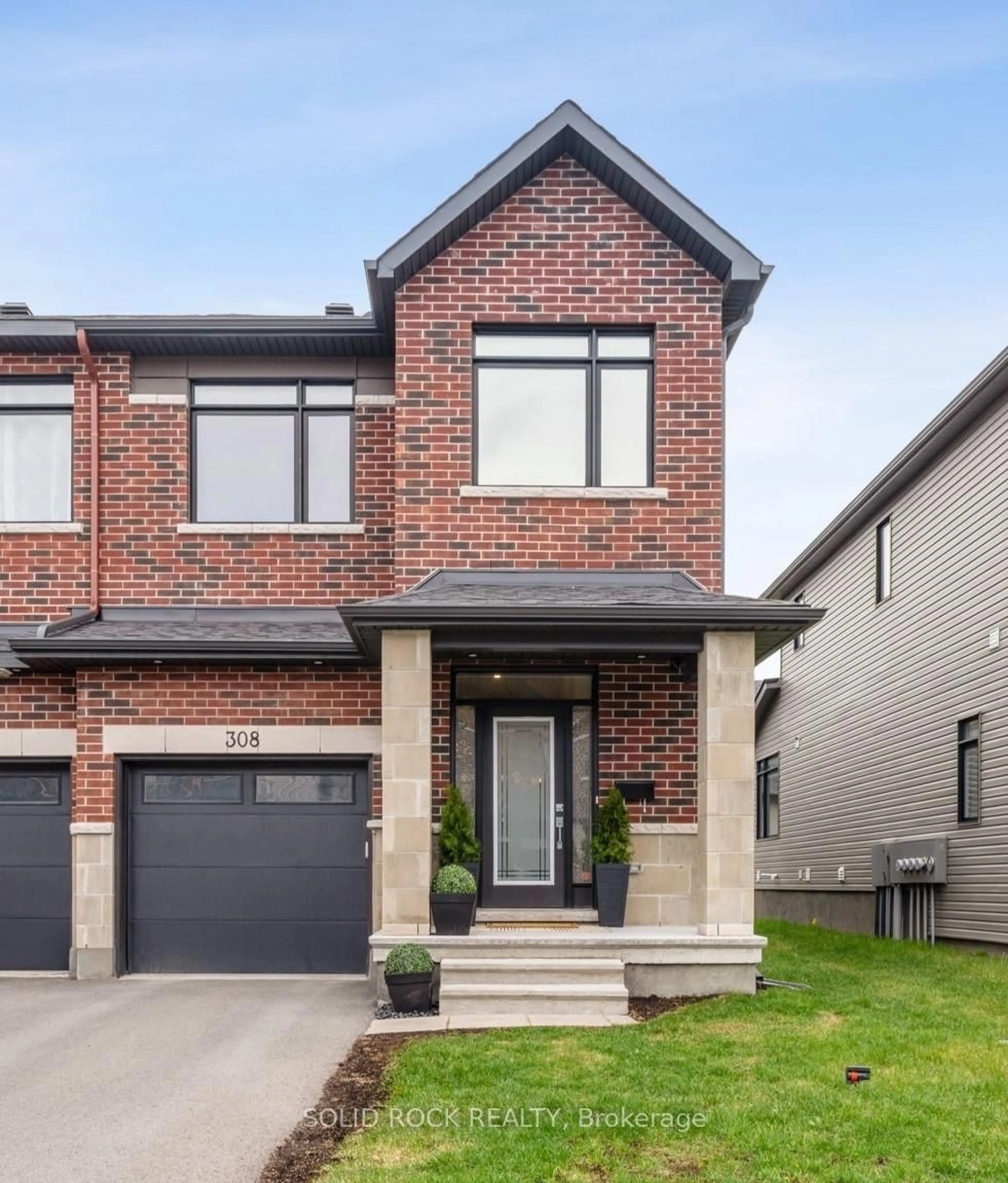 Home with brick exterior material, street for 308 Affogato Walk, Ottawa Ontario K2J 6Y8