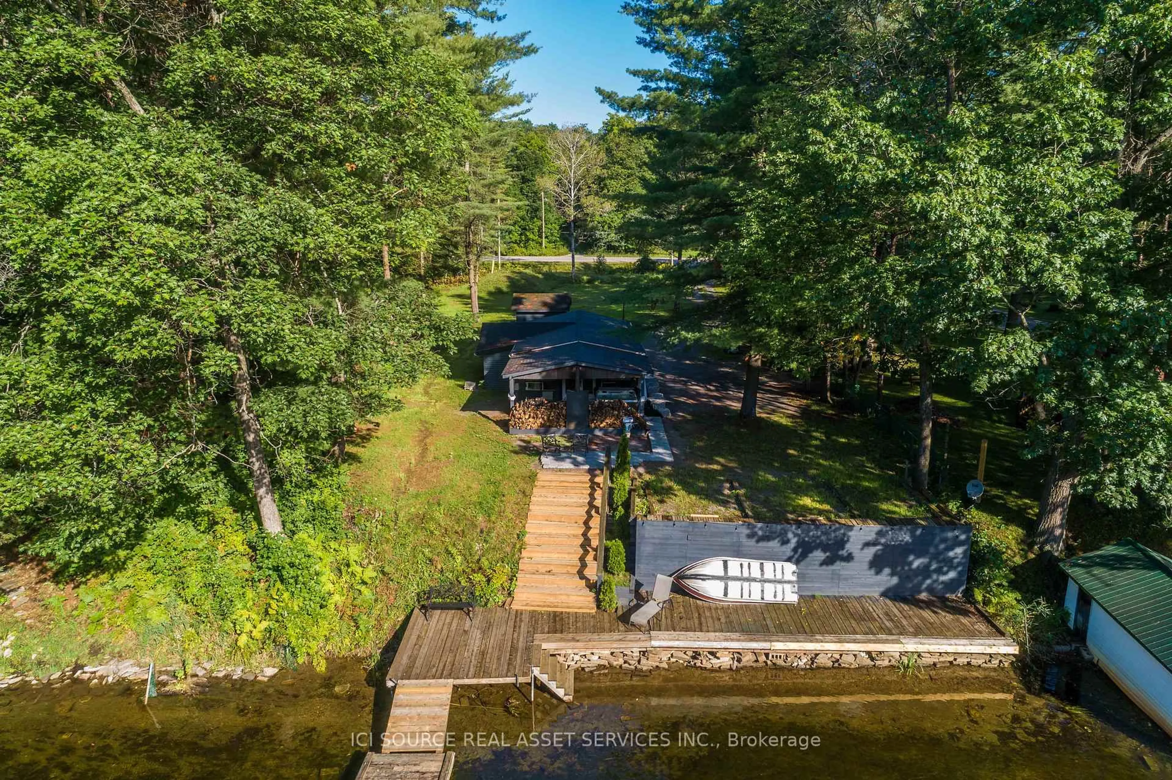 A pic from outside/outdoor area/front of a property/back of a property/a pic from drone, water/lake/river/ocean view for 3526 Monck Rd, Kawartha Lakes Ontario K0M 2L0