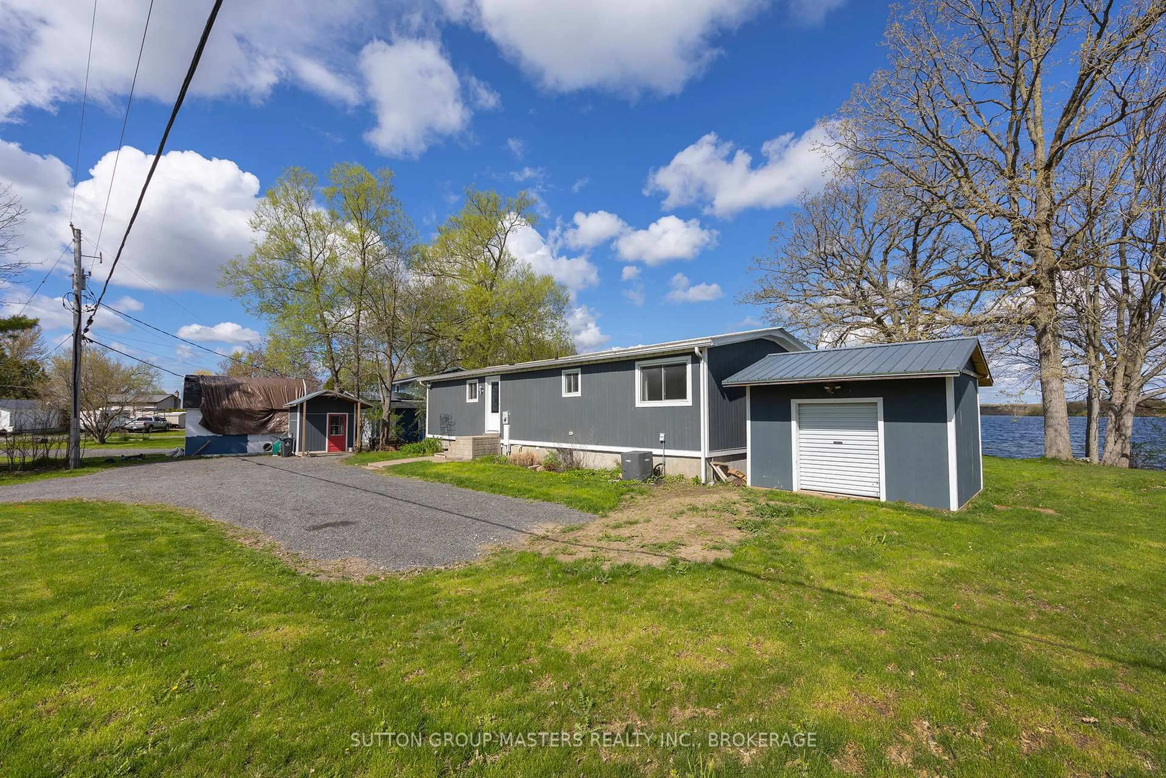 A pic from outside/outdoor area/front of a property/back of a property/a pic from drone, street for 800 Natureshores Lane #14, Kingston Ontario K7L 4V3