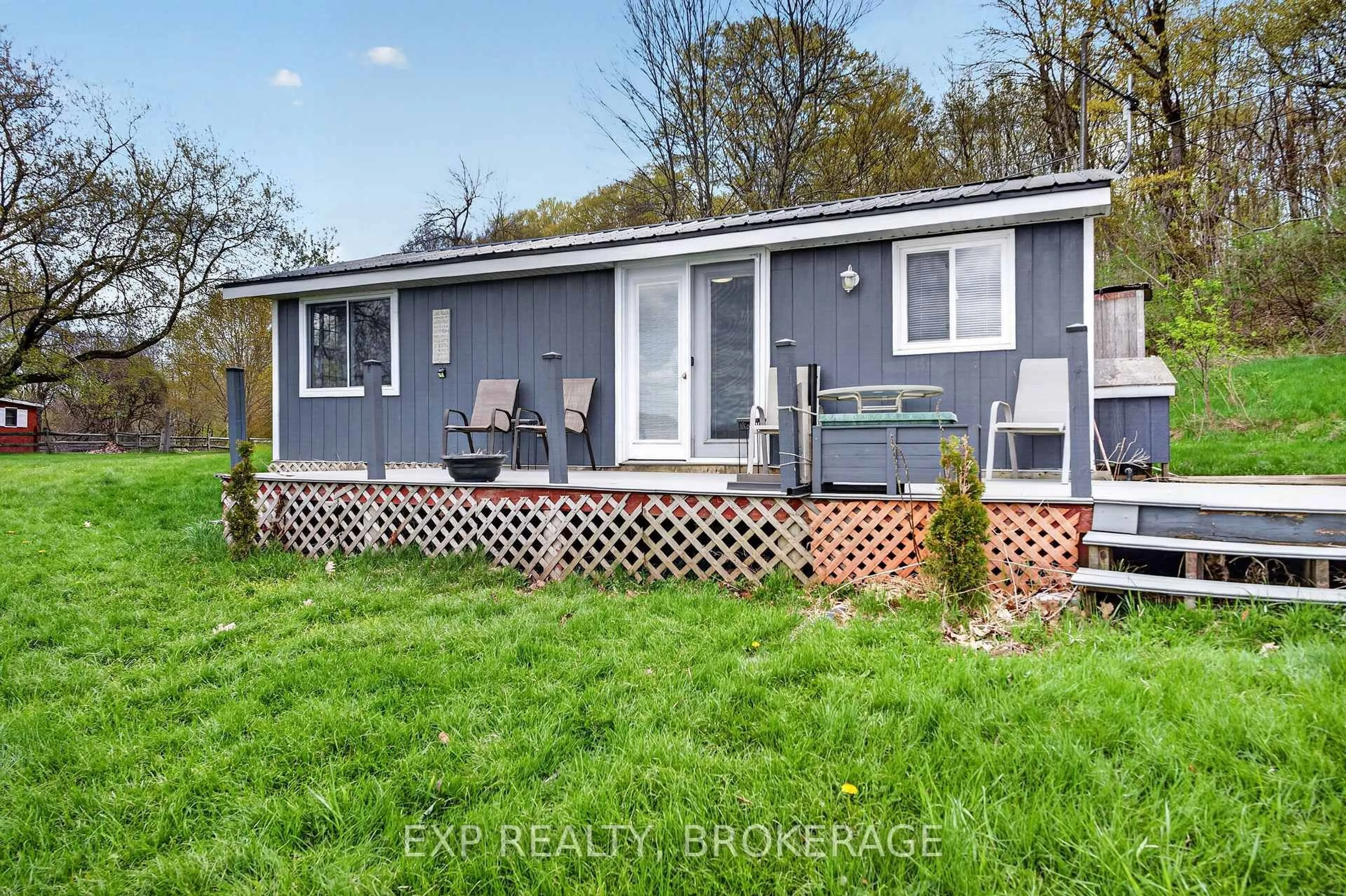 A pic from outside/outdoor area/front of a property/back of a property/a pic from drone, street for 178 ALARIE Lane, Wolfe Island Ontario K0H 2Y0