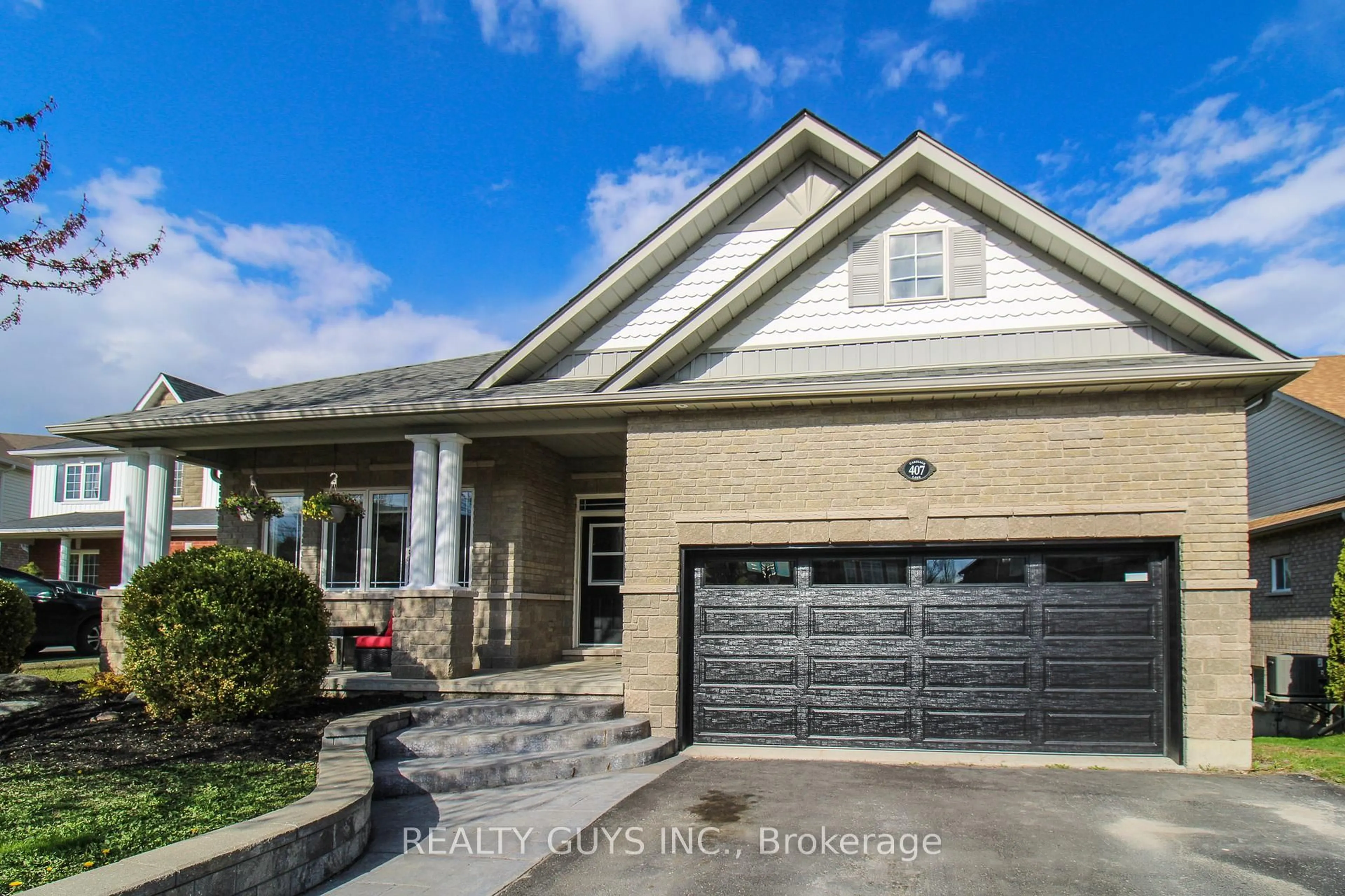 Home with brick exterior material, street for 407 Carriage Lane, Peterborough Ontario K9L 2A5