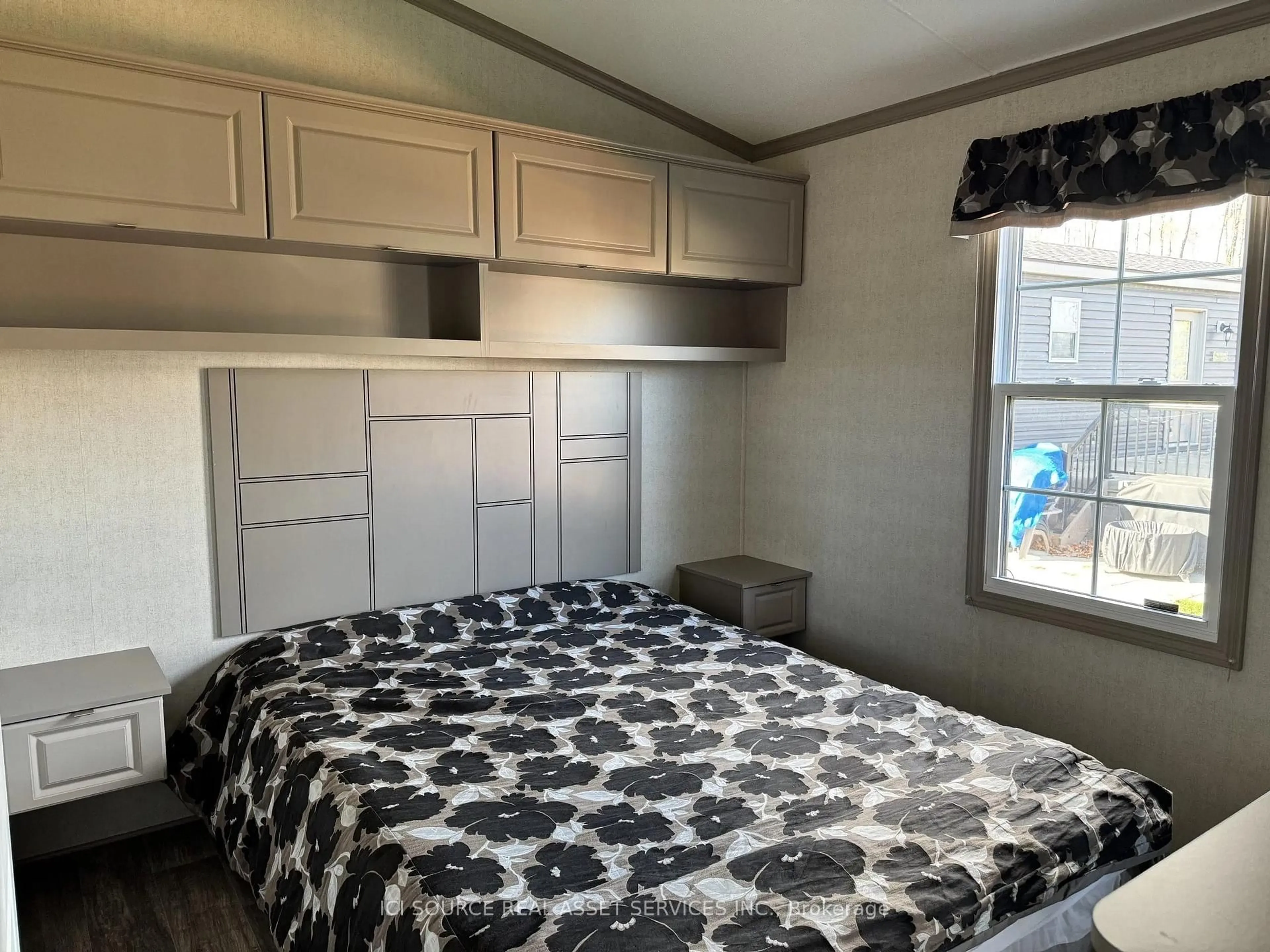 Bedroom with bed, wood/laminate floor for 1235 Villiers Line #LBA014, Otonabee-South Monaghan Ontario K0L 2G0