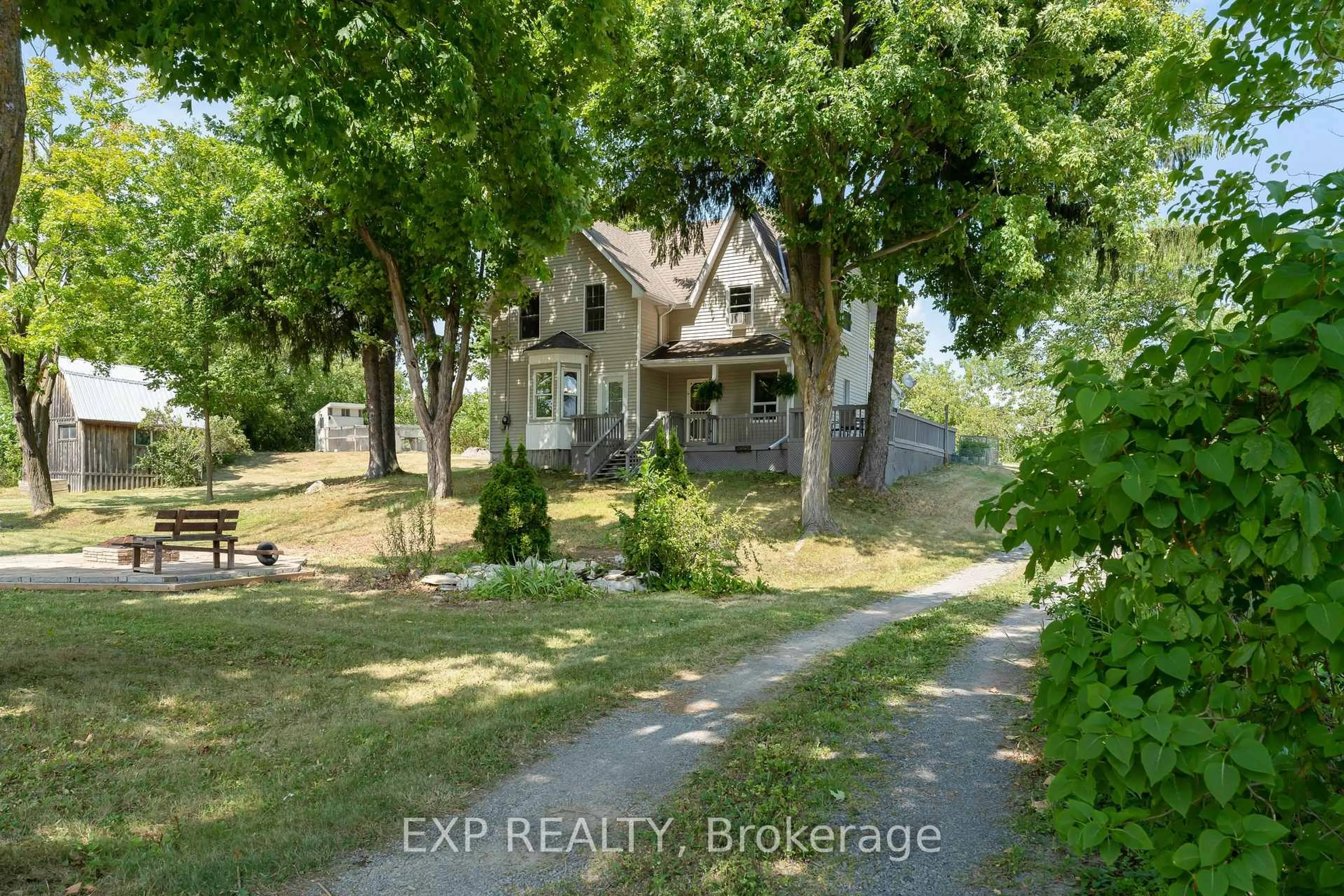A pic from outside/outdoor area/front of a property/back of a property/a pic from drone, street for 8 Peel St, Tamworth Ontario K0K 3G0