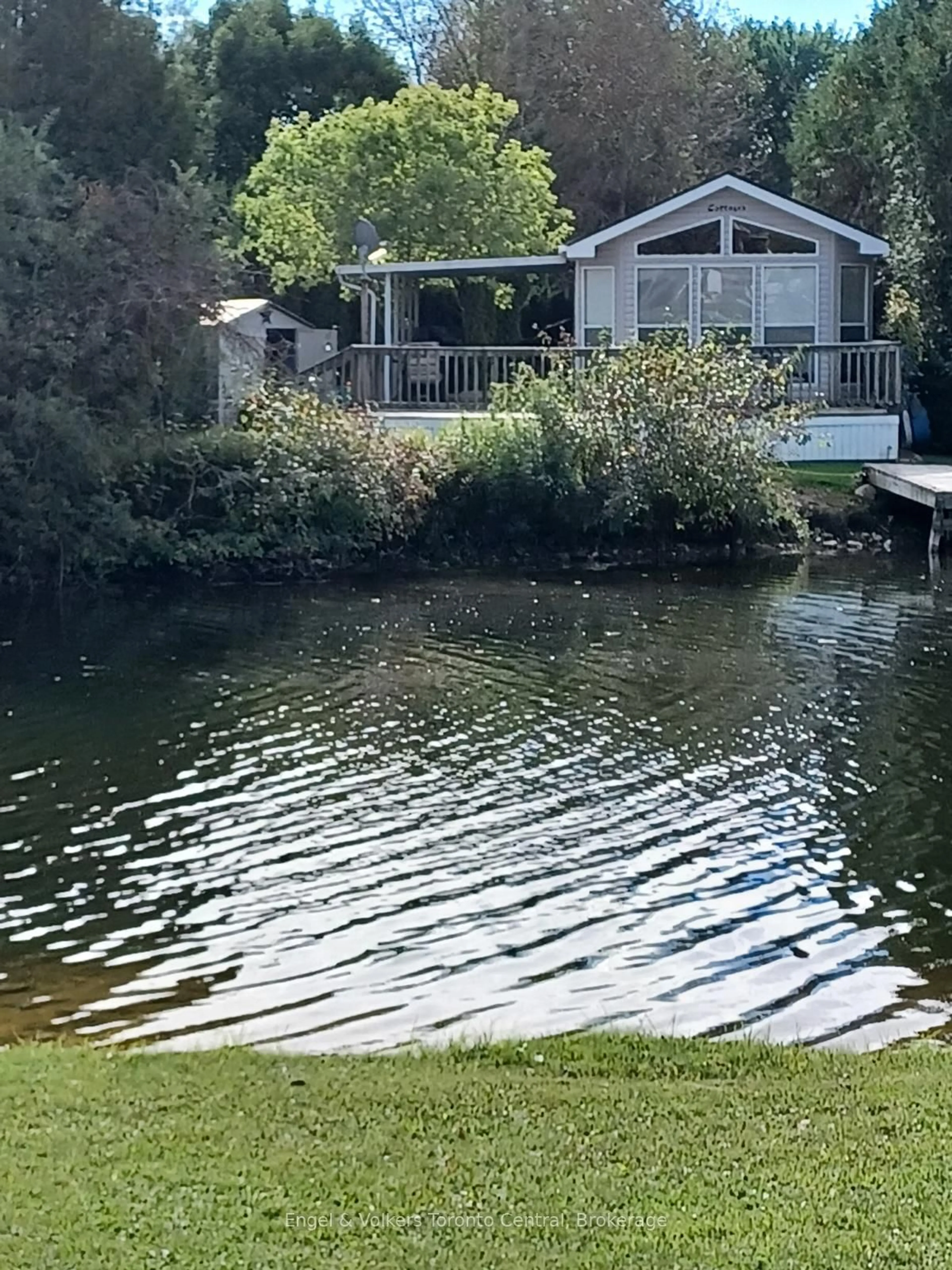 A pic from outside/outdoor area/front of a property/back of a property/a pic from drone, water/lake/river/ocean view for 7489 SIDEROAD 5 #B2, Wellington North Ontario N0G 2L0