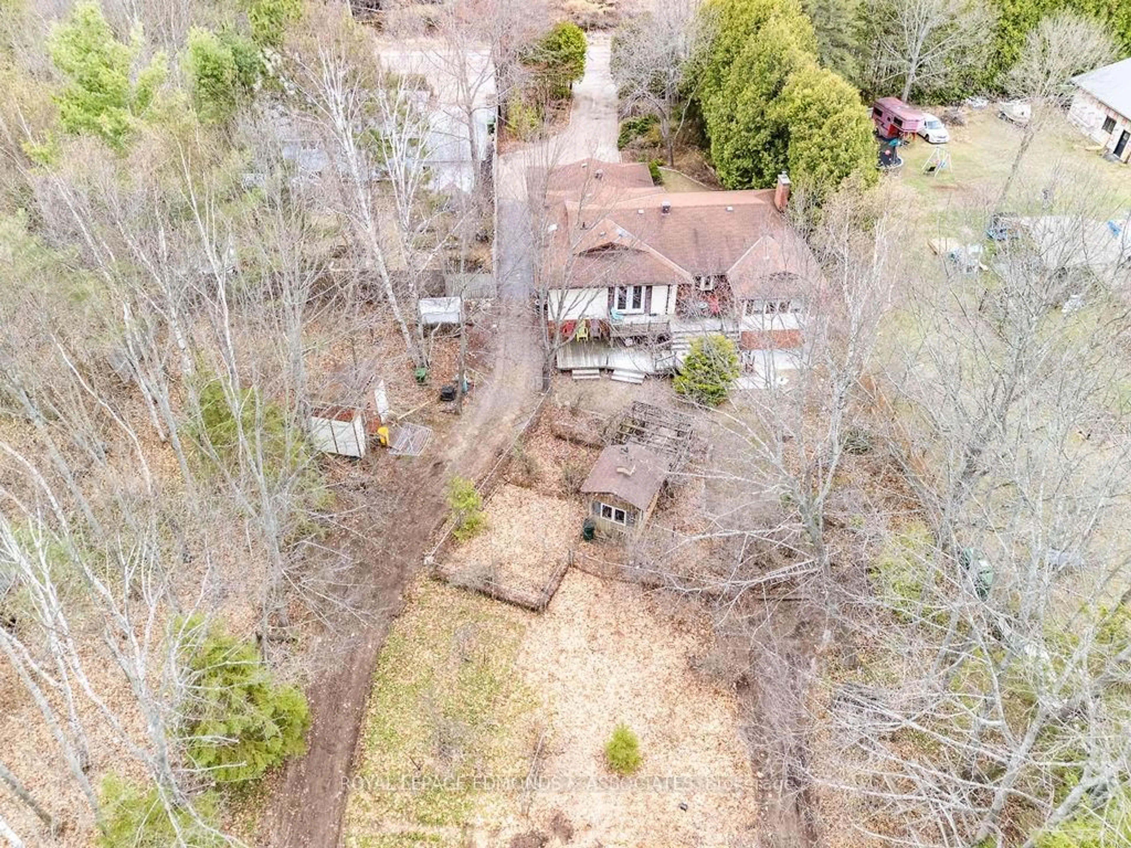 A pic from outside/outdoor area/front of a property/back of a property/a pic from drone, forest/trees view for 1411 Victoria St, Petawawa Ontario K8H 3K4
