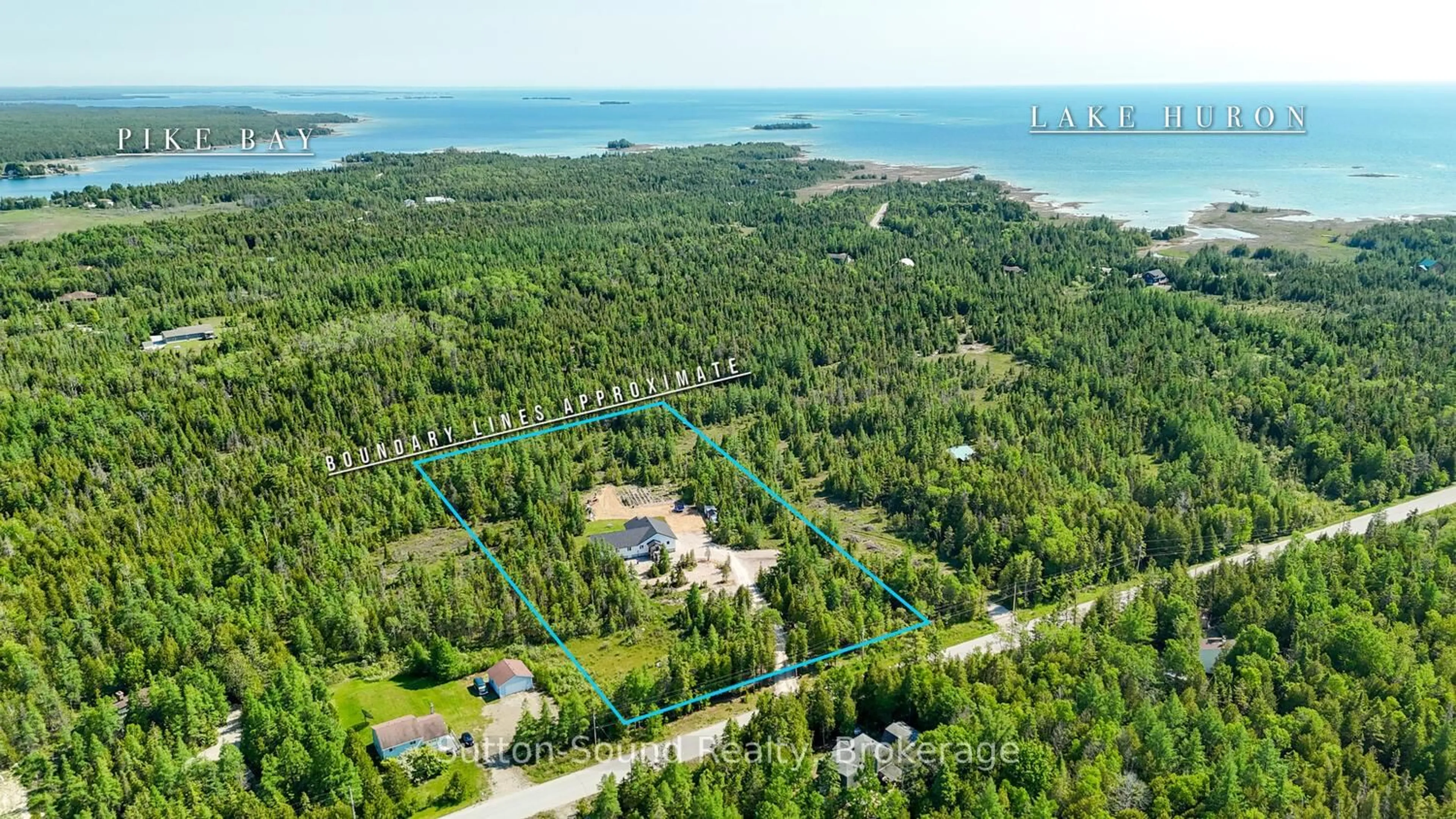 A pic from outside/outdoor area/front of a property/back of a property/a pic from drone, water/lake/river/ocean view for 107 Whiskey Harbour Rd, Northern Bruce Peninsula Ontario N0H 2T0