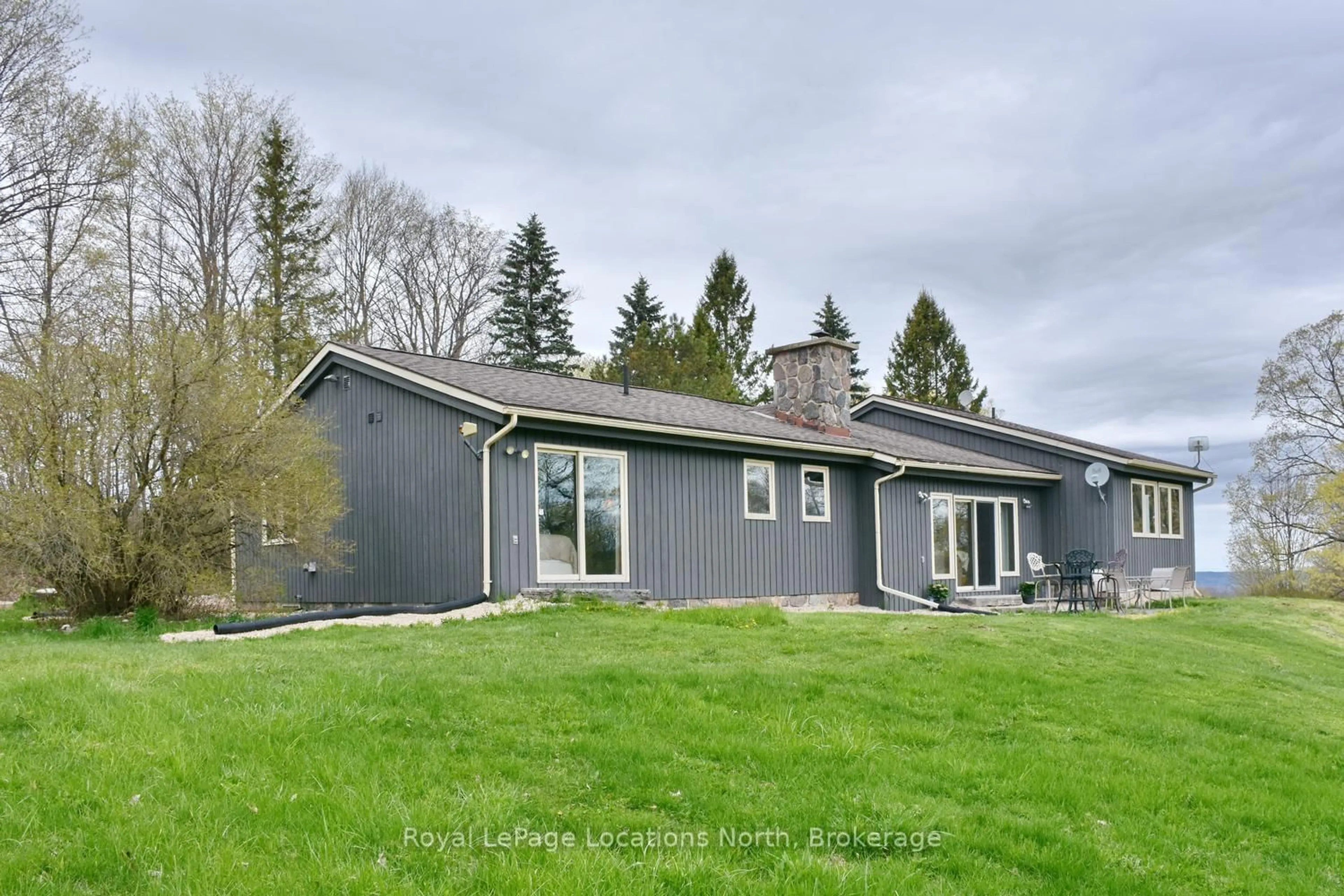 A pic from outside/outdoor area/front of a property/back of a property/a pic from drone, unknown for 446070 Johnston's Sdrd, Grey Highlands Ontario N0C 1E0