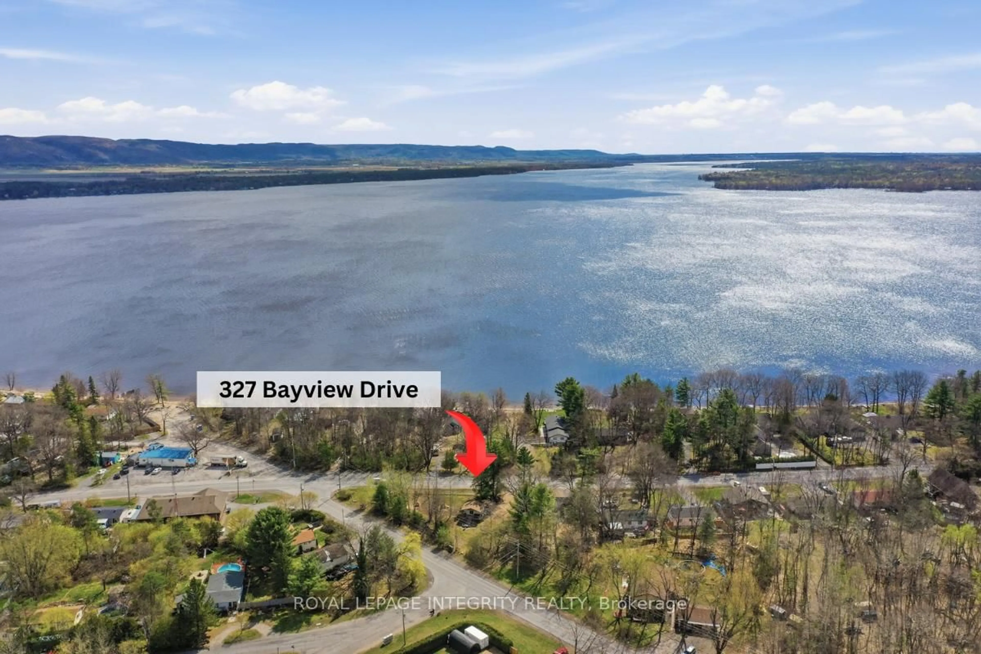 A pic from outside/outdoor area/front of a property/back of a property/a pic from drone, water/lake/river/ocean view for 327 Bayview Dr, Ottawa Ontario K0A 3M0