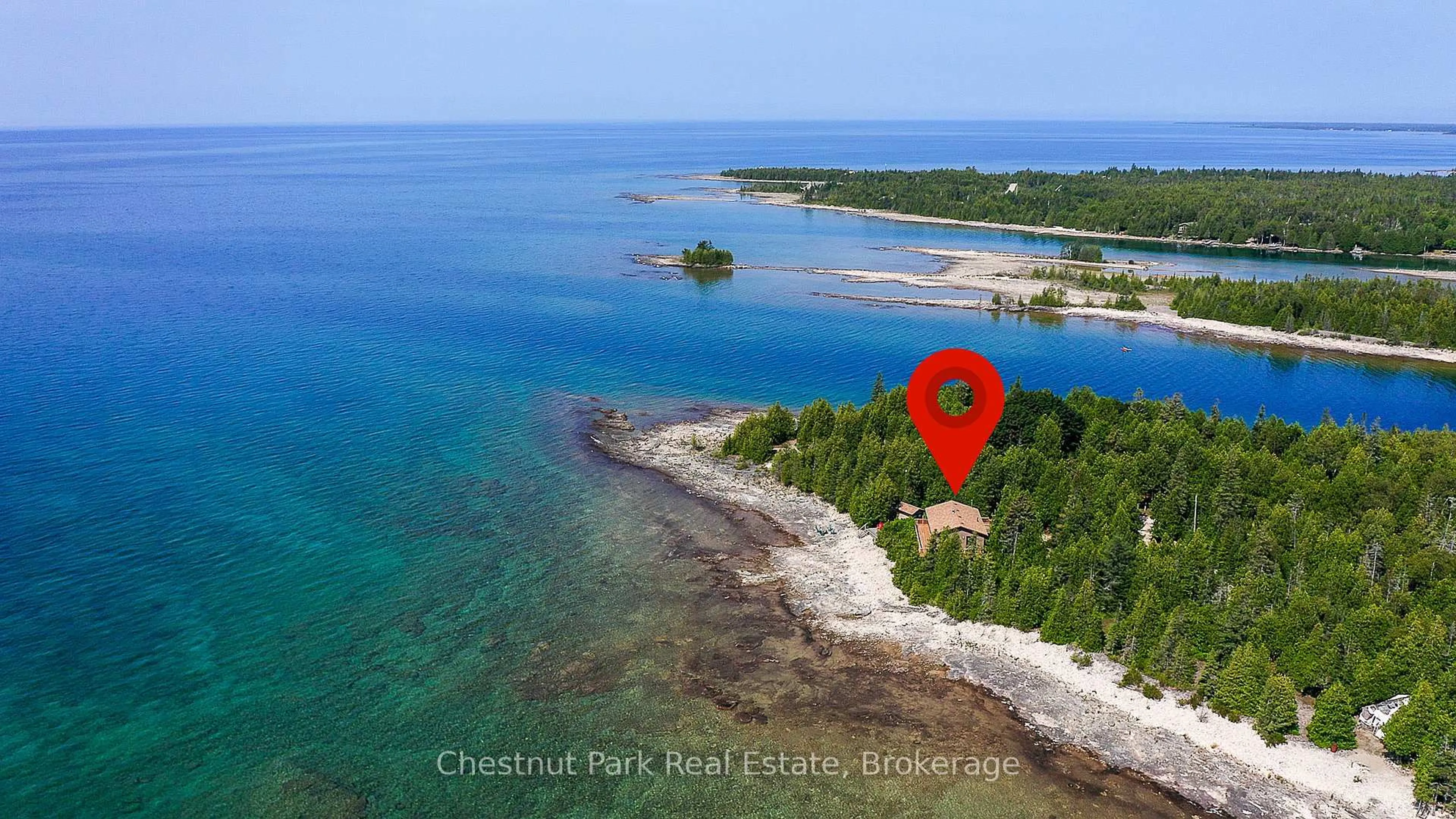 A pic from outside/outdoor area/front of a property/back of a property/a pic from drone, water/lake/river/ocean view for 79 Howard Bowman Dr, Northern Bruce Peninsula Ontario N0H 2R0