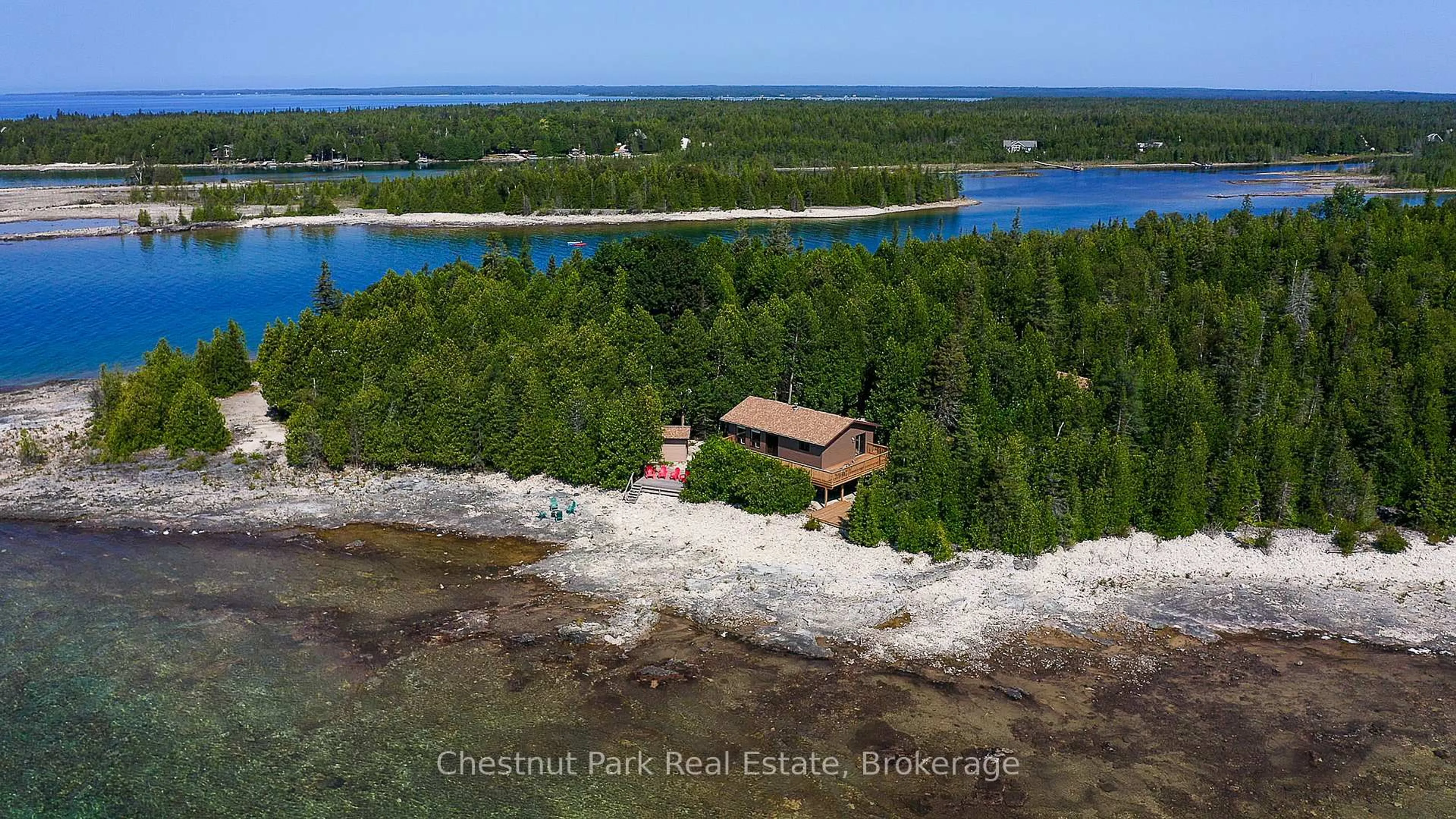 A pic from outside/outdoor area/front of a property/back of a property/a pic from drone, water/lake/river/ocean view for 79 Howard Bowman Dr, Northern Bruce Peninsula Ontario N0H 2R0