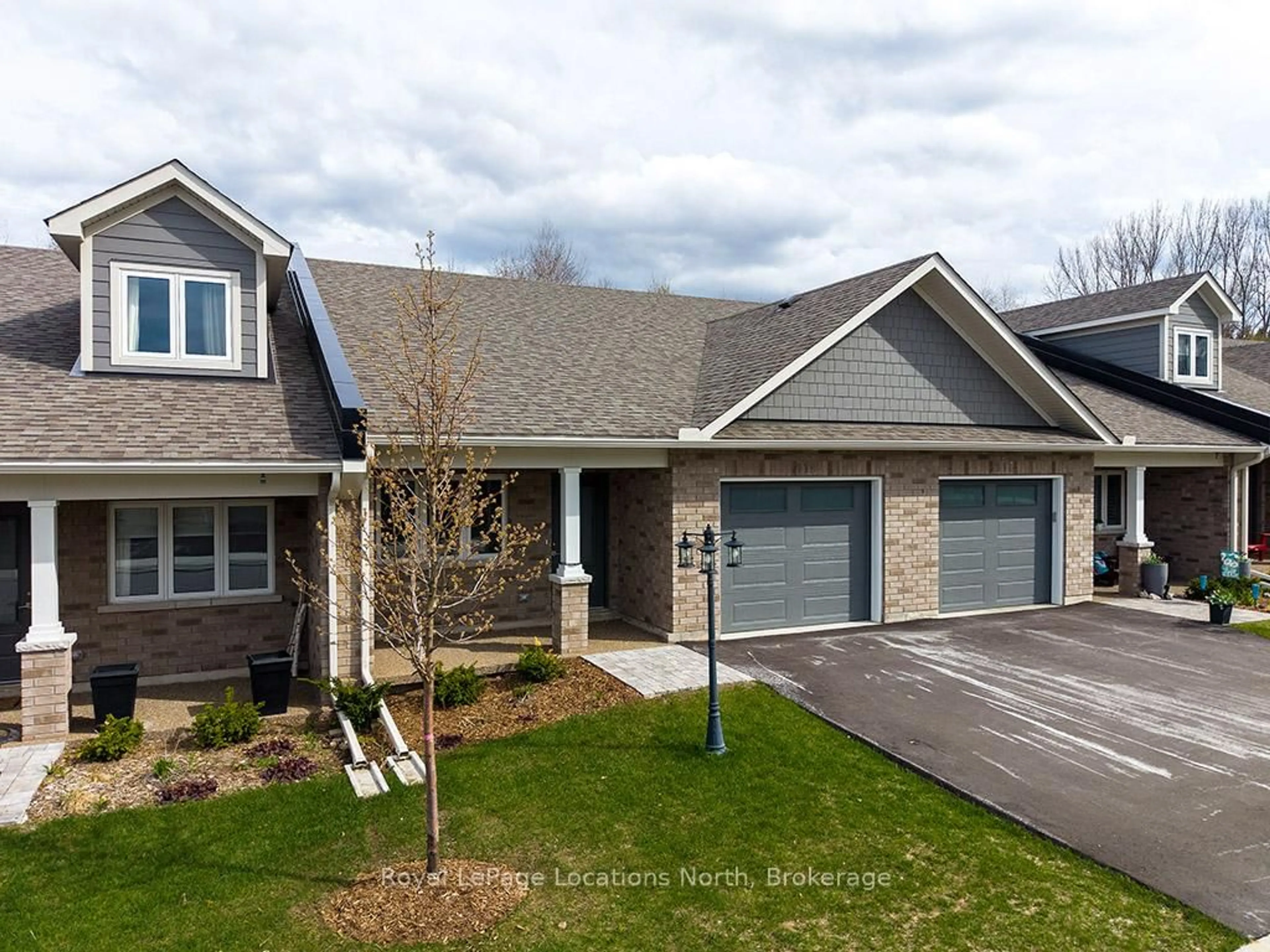 Home with brick exterior material, street for 119 Dove Dr, Blue Mountains Ontario N0H 2P0