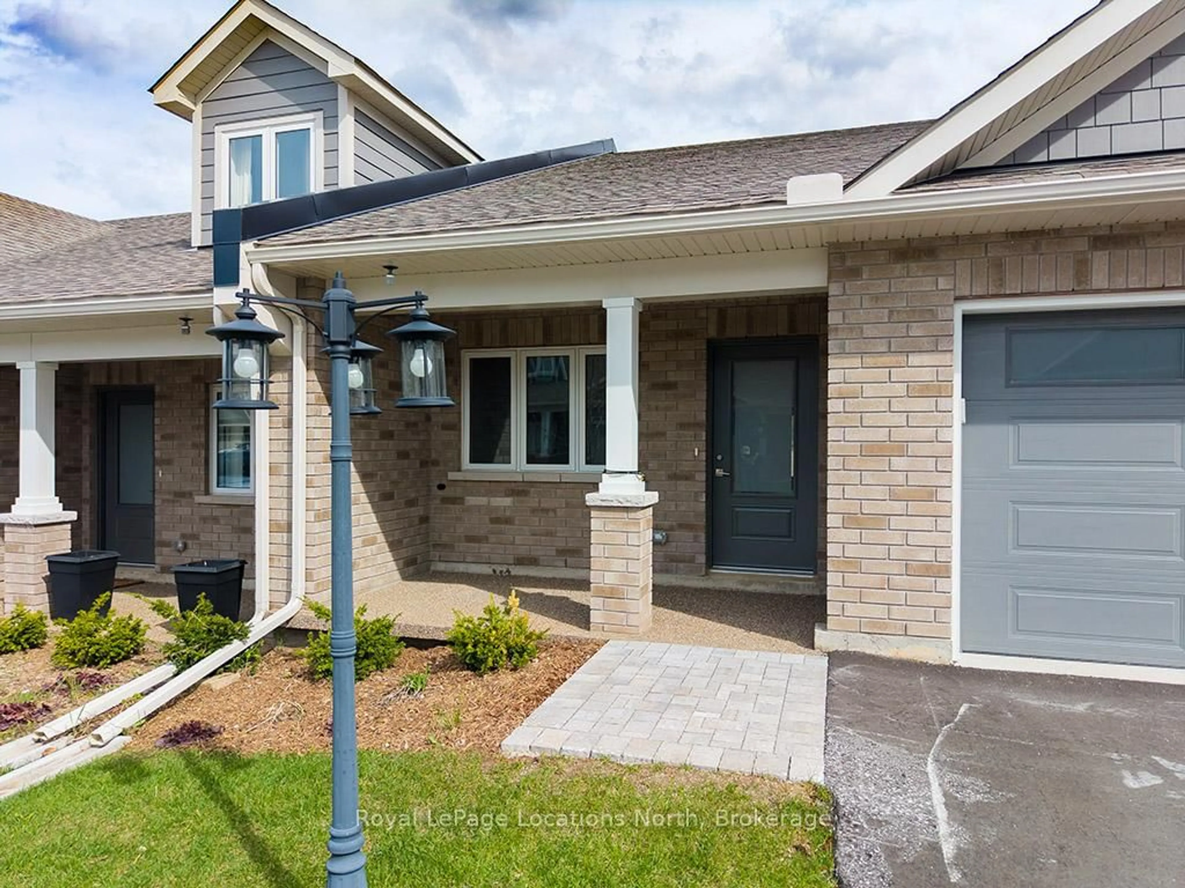 Home with brick exterior material, street for 119 Dove Dr, Blue Mountains Ontario N0H 2P0