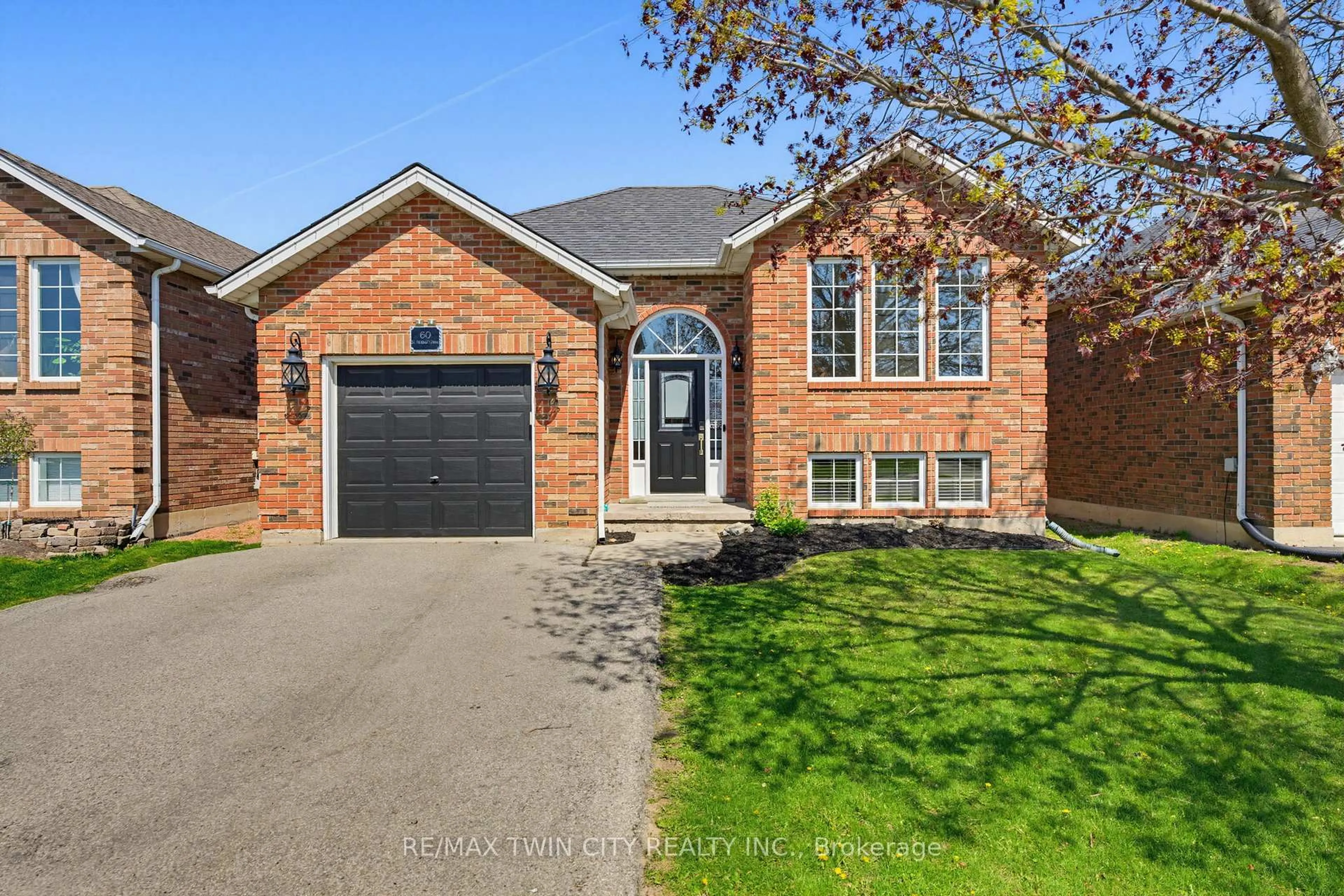 Home with brick exterior material, street for 60 St Patrick's Dr, Brantford Ontario N3T 6L4